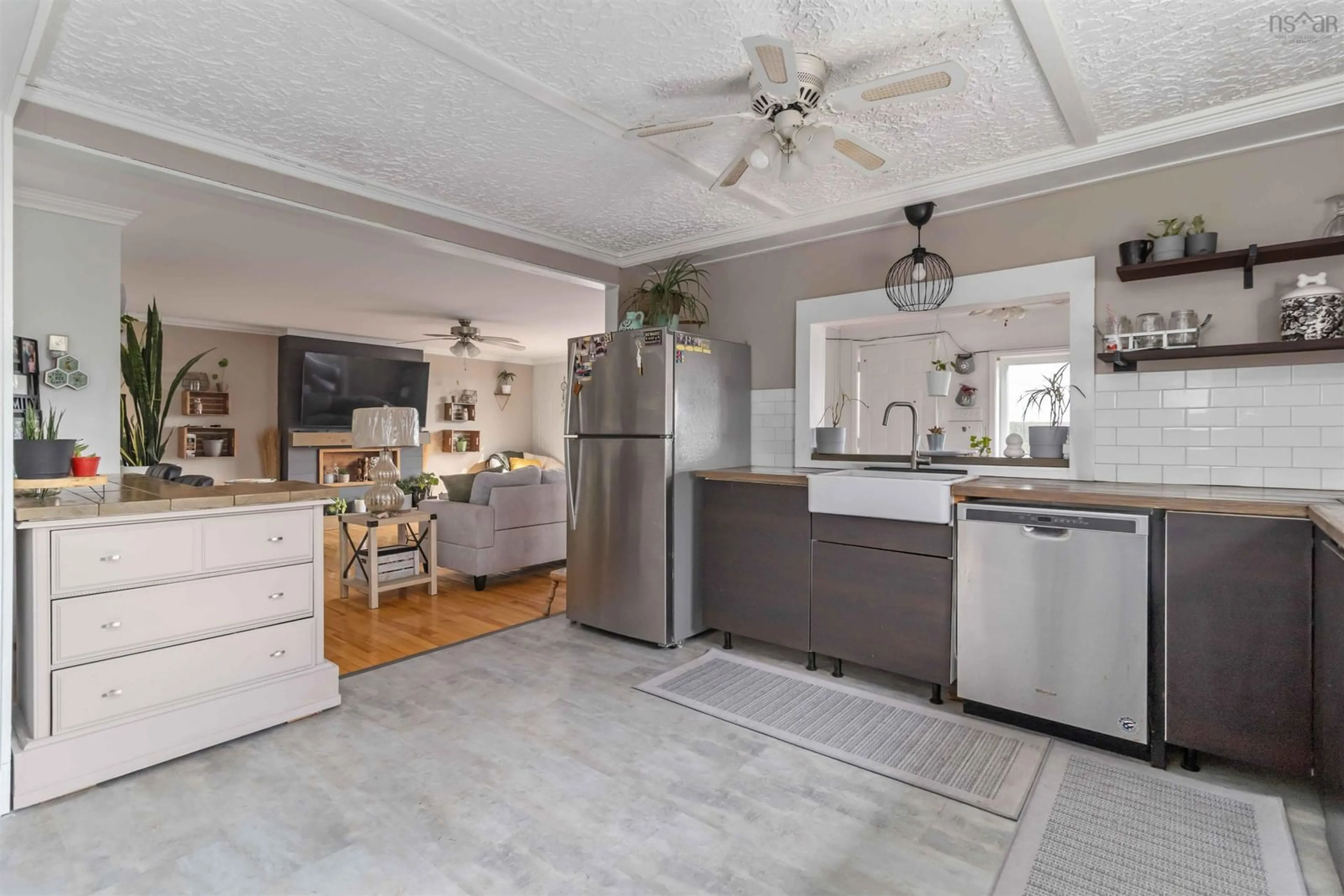 Open concept kitchen, ceramic/tile floor for 21 Littles Rd, Terence Bay Nova Scotia B3T 1Y7