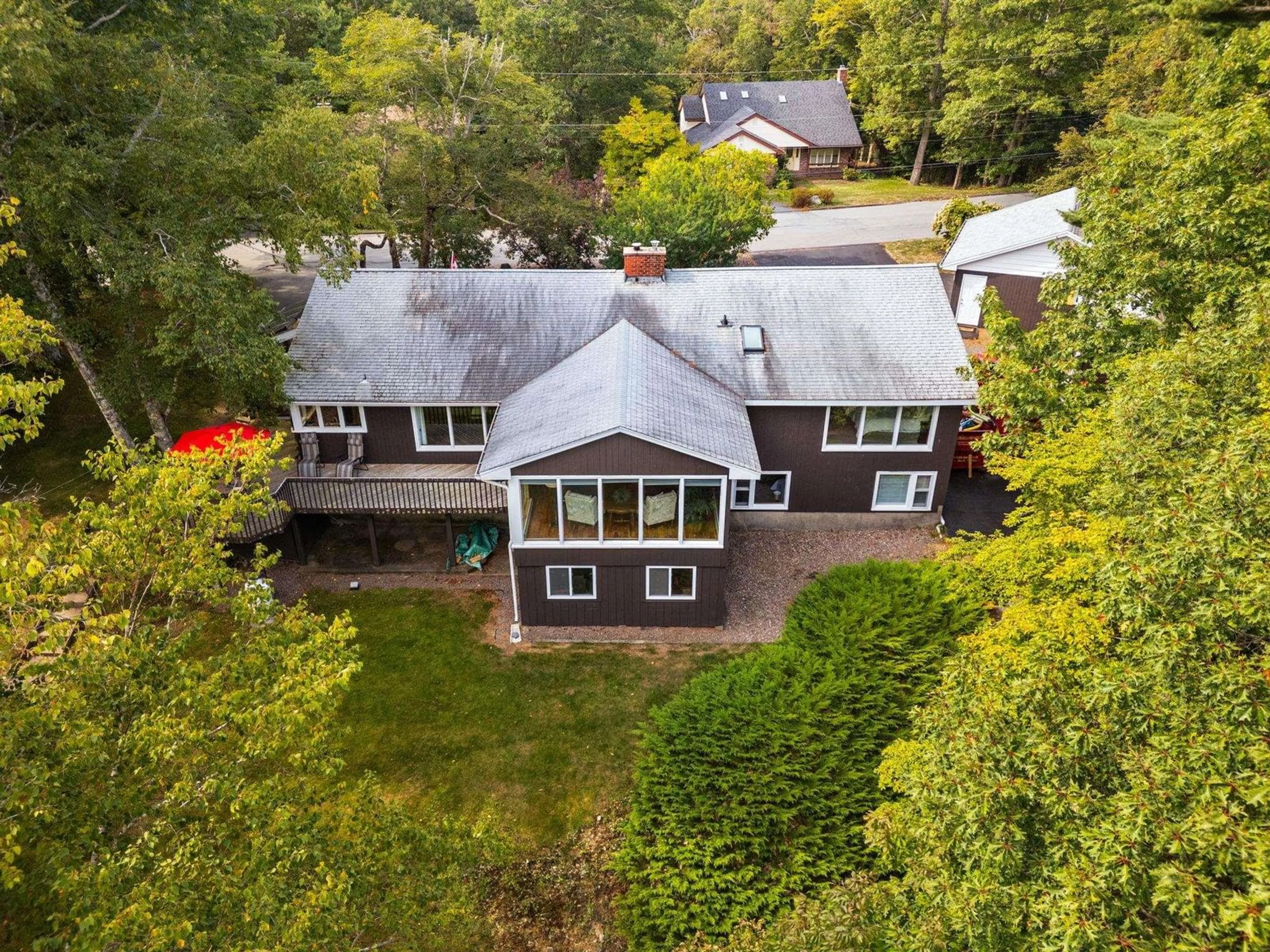 A pic from outside/outdoor area/front of a property/back of a property/a pic from drone, unknown for 60 Ridge Ave, Waverley Nova Scotia B2R 1G4