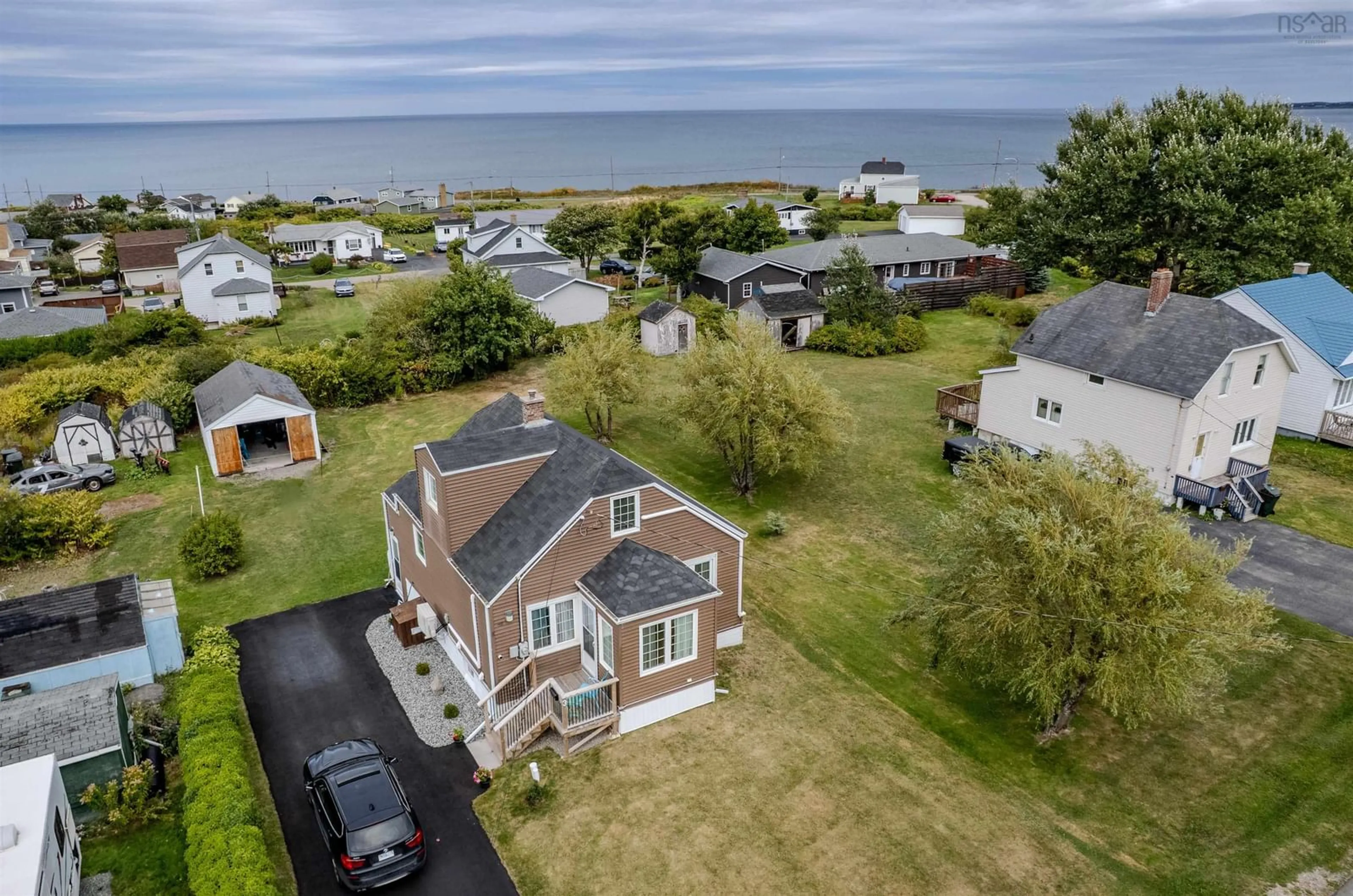 A pic from outside/outdoor area/front of a property/back of a property/a pic from drone, water/lake/river/ocean view for 3 Essex St, Glace Bay Nova Scotia B1A 5H3