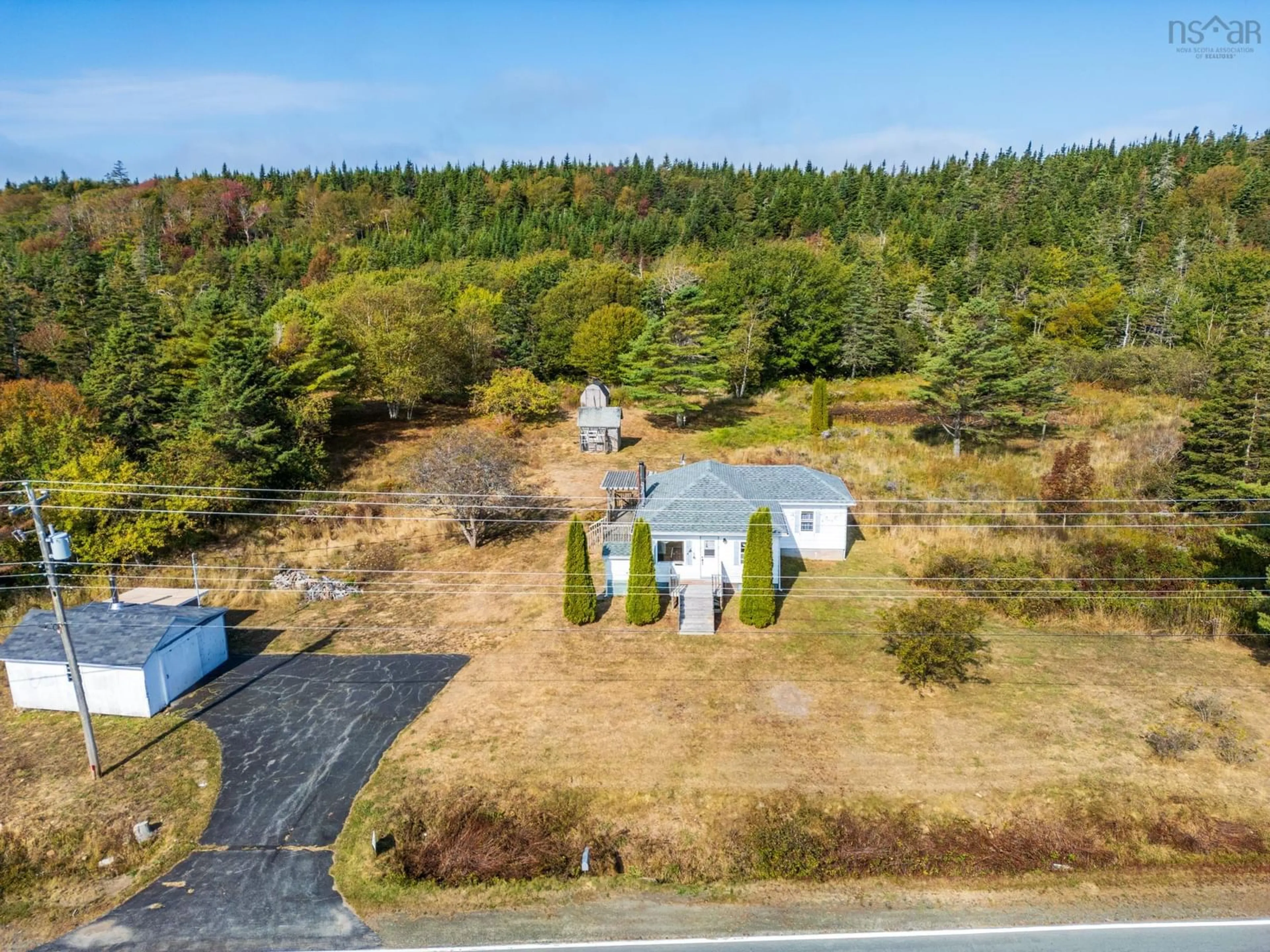 A pic from outside/outdoor area/front of a property/back of a property/a pic from drone, forest/trees view for 4405 Highway 217, Tiddville Nova Scotia B0V 1E0
