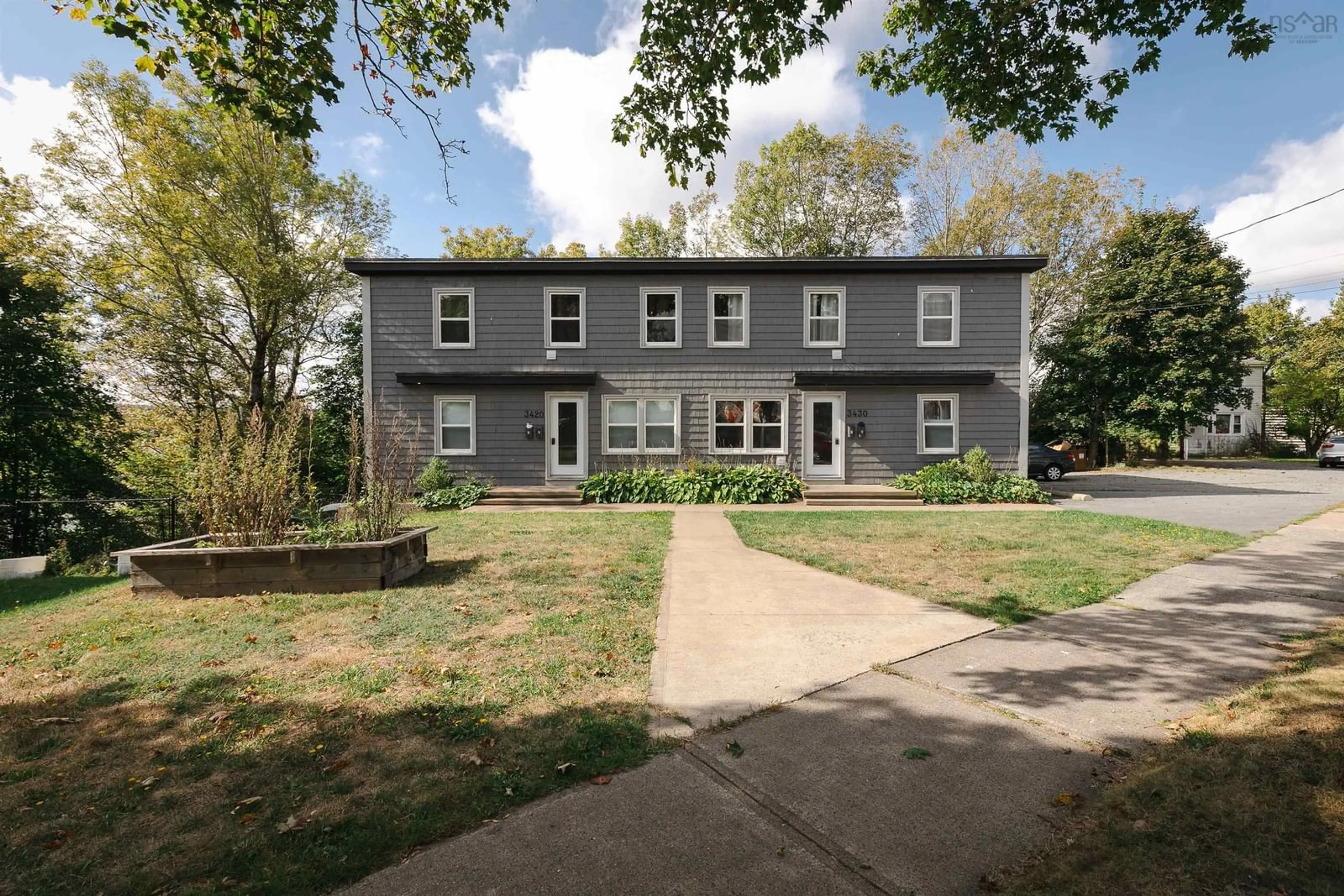 A pic from outside/outdoor area/front of a property/back of a property/a pic from drone, street for 3420/3430 Claremont St, Halifax Nova Scotia B3L 3L7