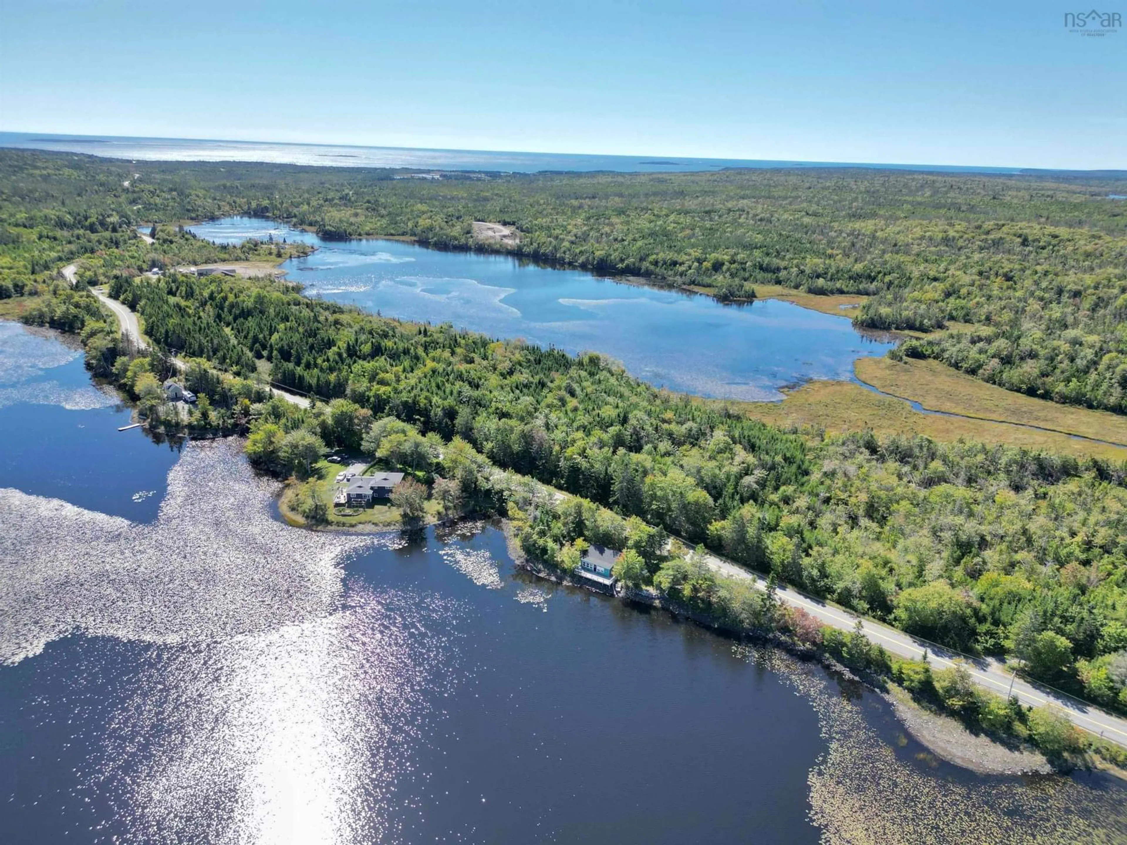 A pic from outside/outdoor area/front of a property/back of a property/a pic from drone, water/lake/river/ocean view for 5218 Clam Harbour Rd, Lake Charlotte Nova Scotia B0J 2L0