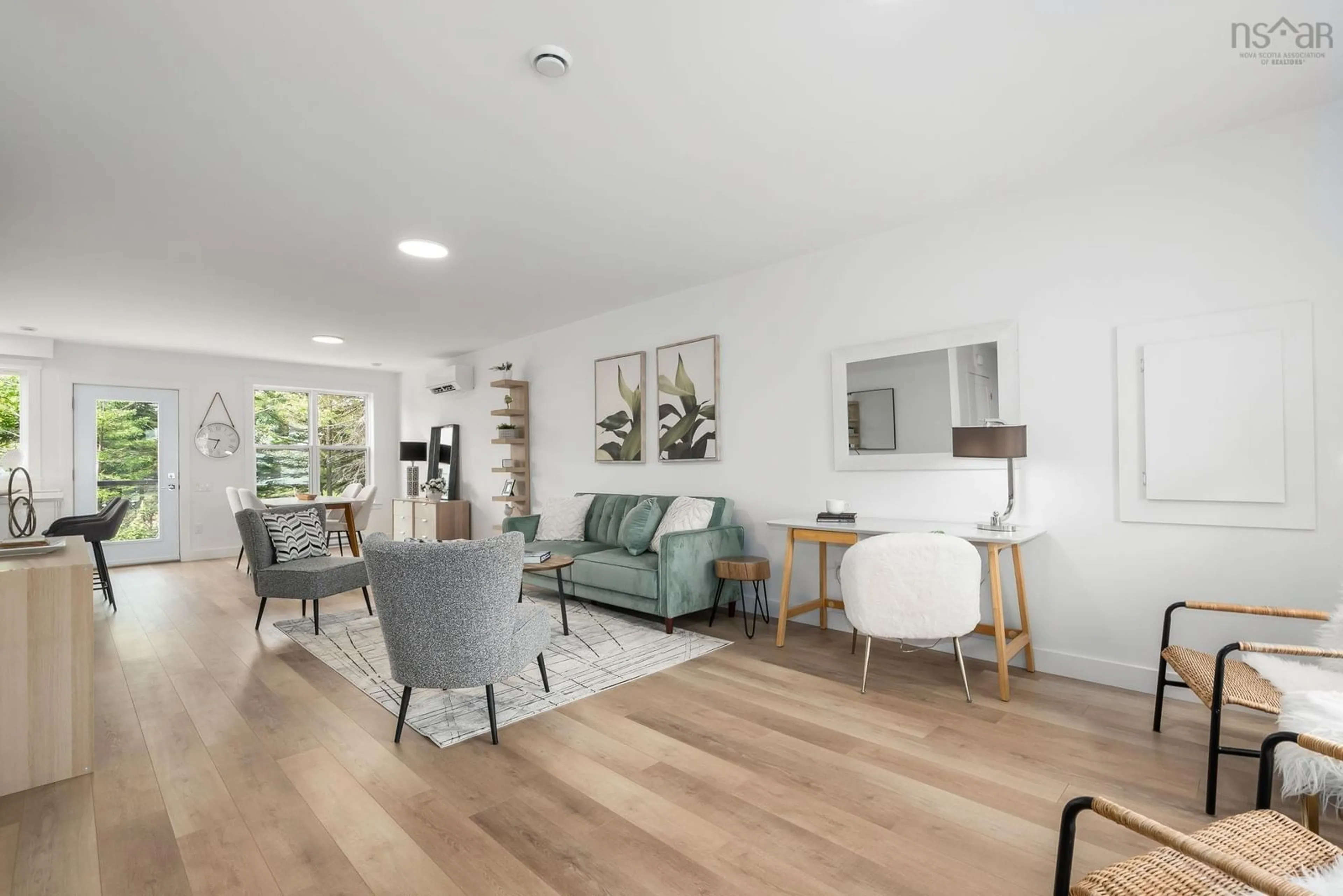 Living room with furniture, wood/laminate floor for 29 Berm St #Lot 26A, Herring Cove Nova Scotia B3R 0H2
