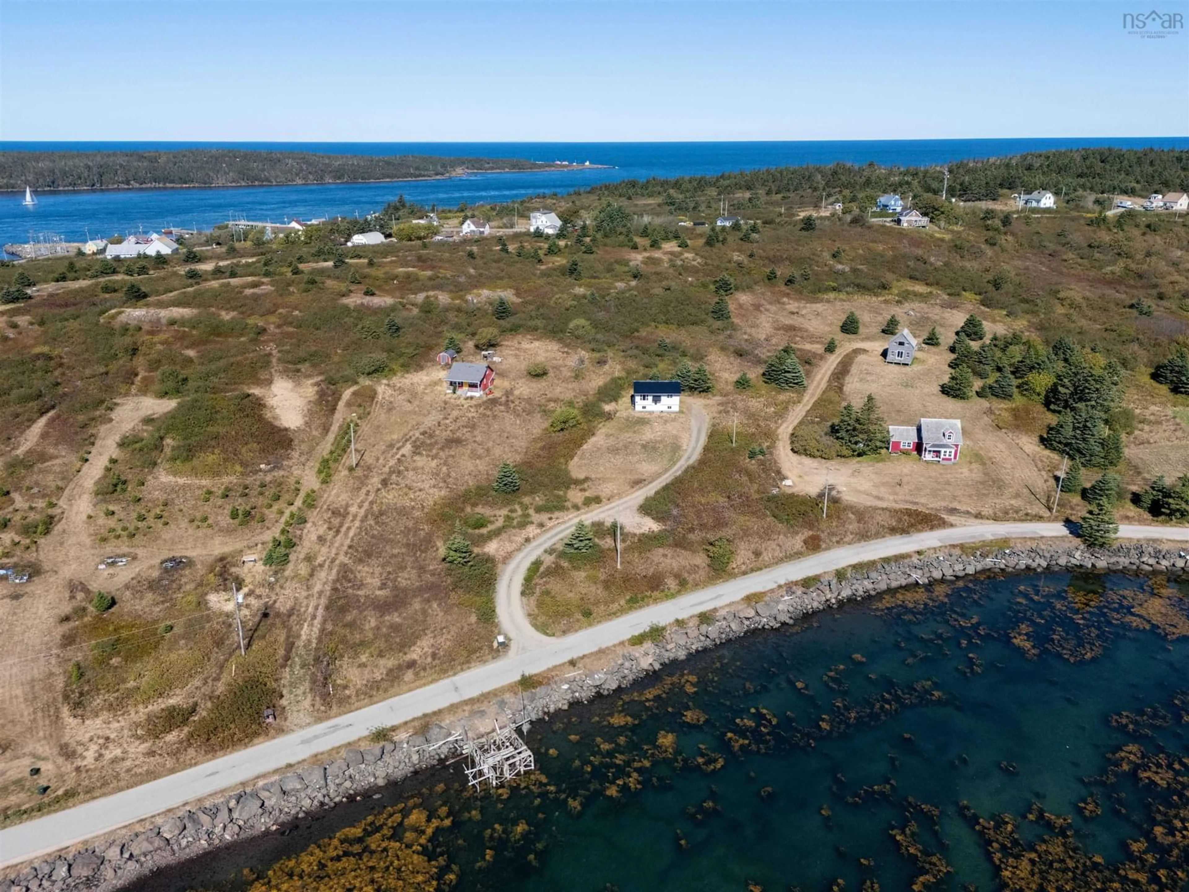 A pic from outside/outdoor area/front of a property/back of a property/a pic from drone, water/lake/river/ocean view for 113 Water Street, Freeport Nova Scotia B0V 1B0