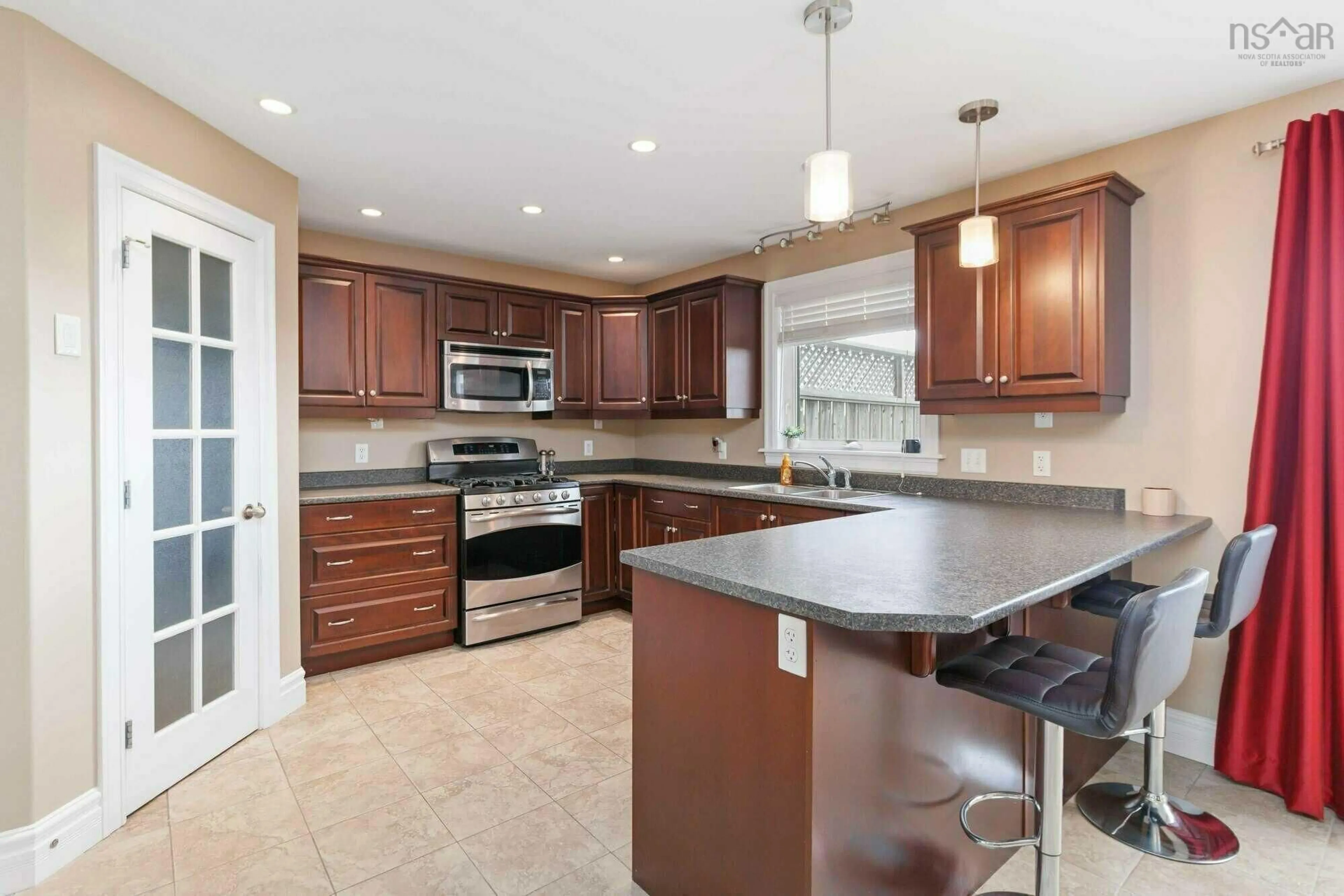 Open concept kitchen, ceramic/tile floor for 75 Joffre St, Dartmouth Nova Scotia B2Y 3C7