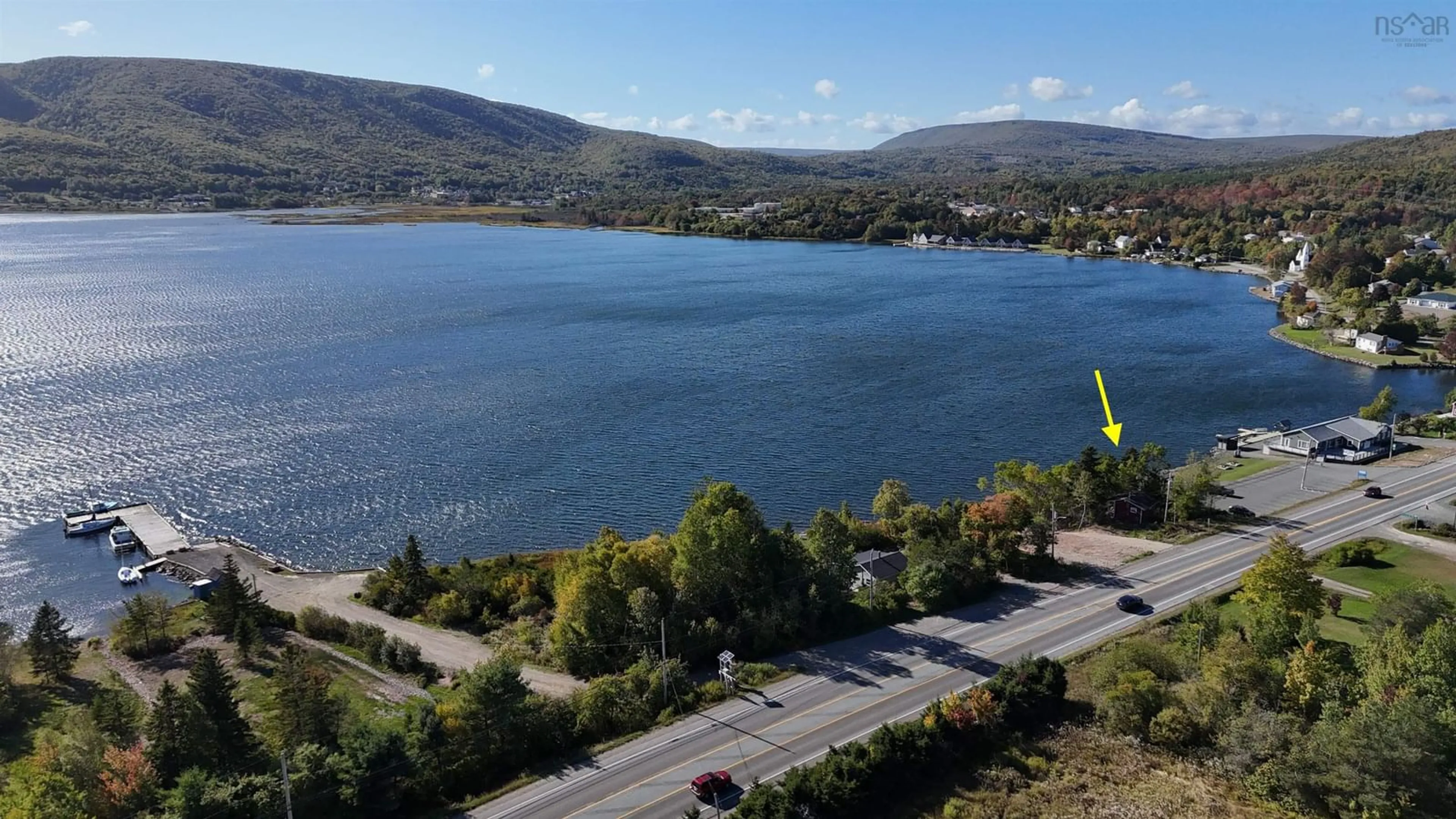 A pic from outside/outdoor area/front of a property/back of a property/a pic from drone, water/lake/river/ocean view for Highway 105, Whycocomagh Nova Scotia B0E 3M0