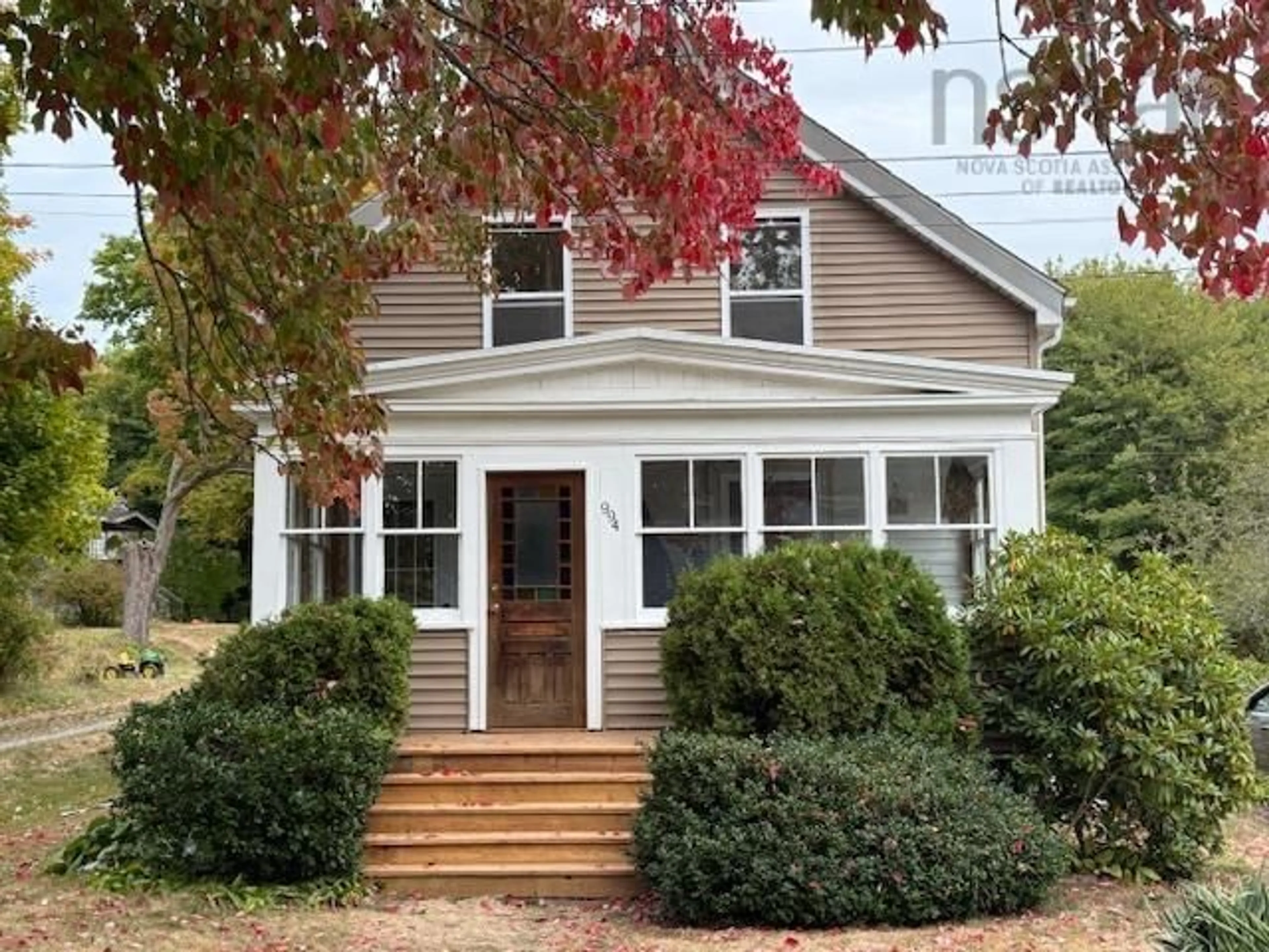 Home with vinyl exterior material, street for 994 Pleasant St, Canning Nova Scotia B0P 1H0