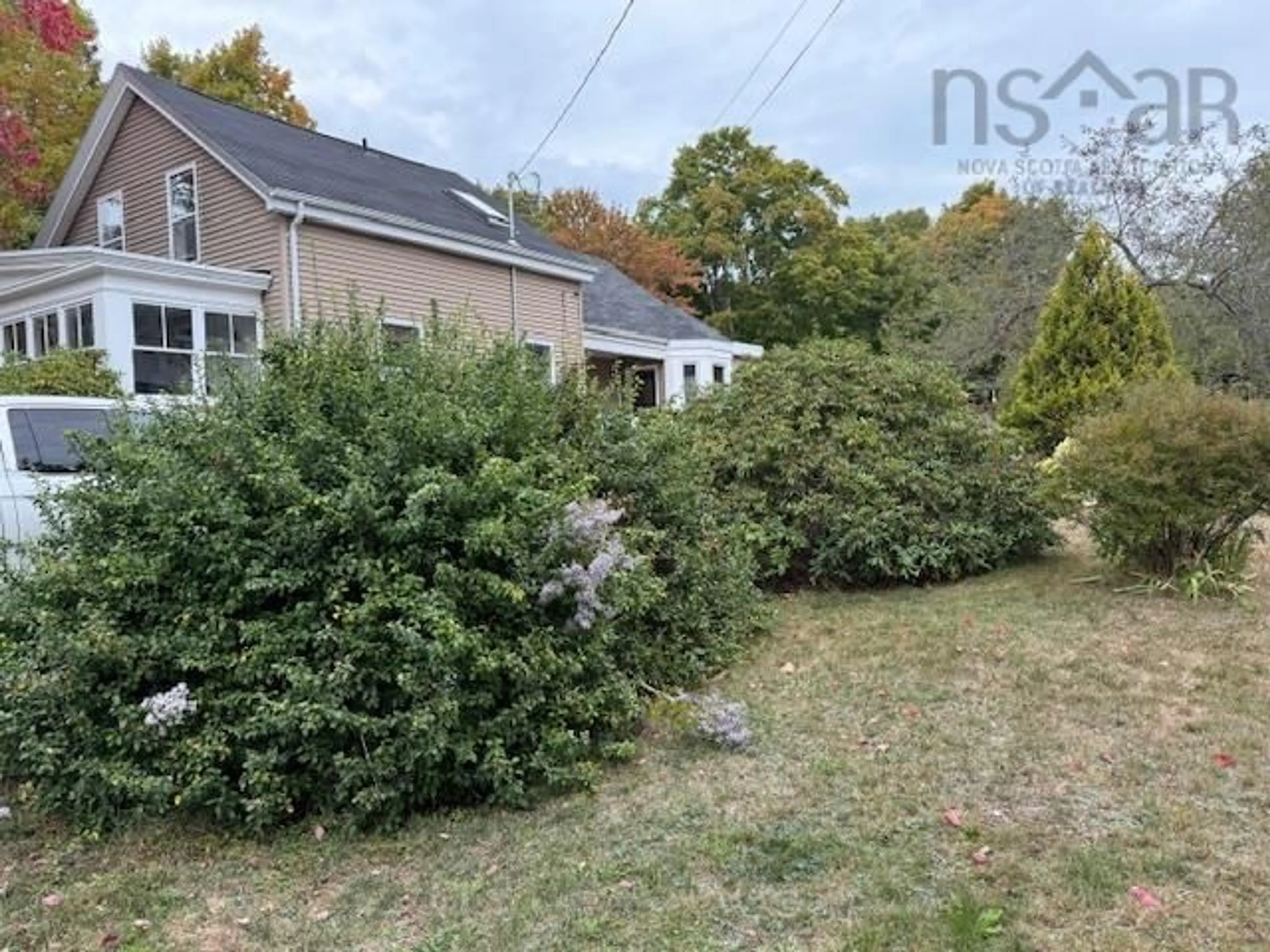 A pic from outside/outdoor area/front of a property/back of a property/a pic from drone, forest/trees view for 994 Pleasant St, Canning Nova Scotia B0P 1H0