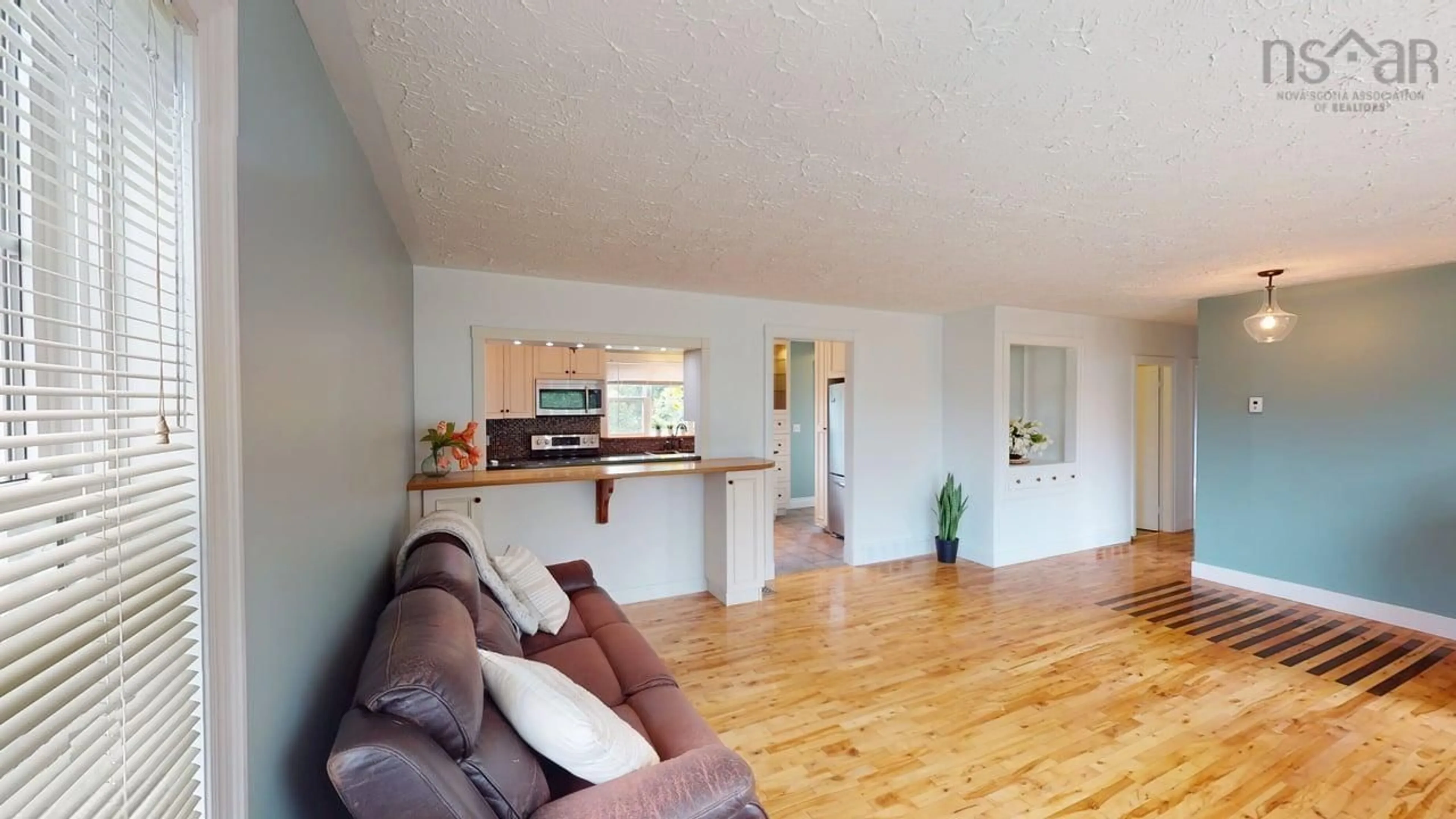 Living room with furniture, wood/laminate floor for 47 Macdonald St, Antigonish Nova Scotia B2G 1M6