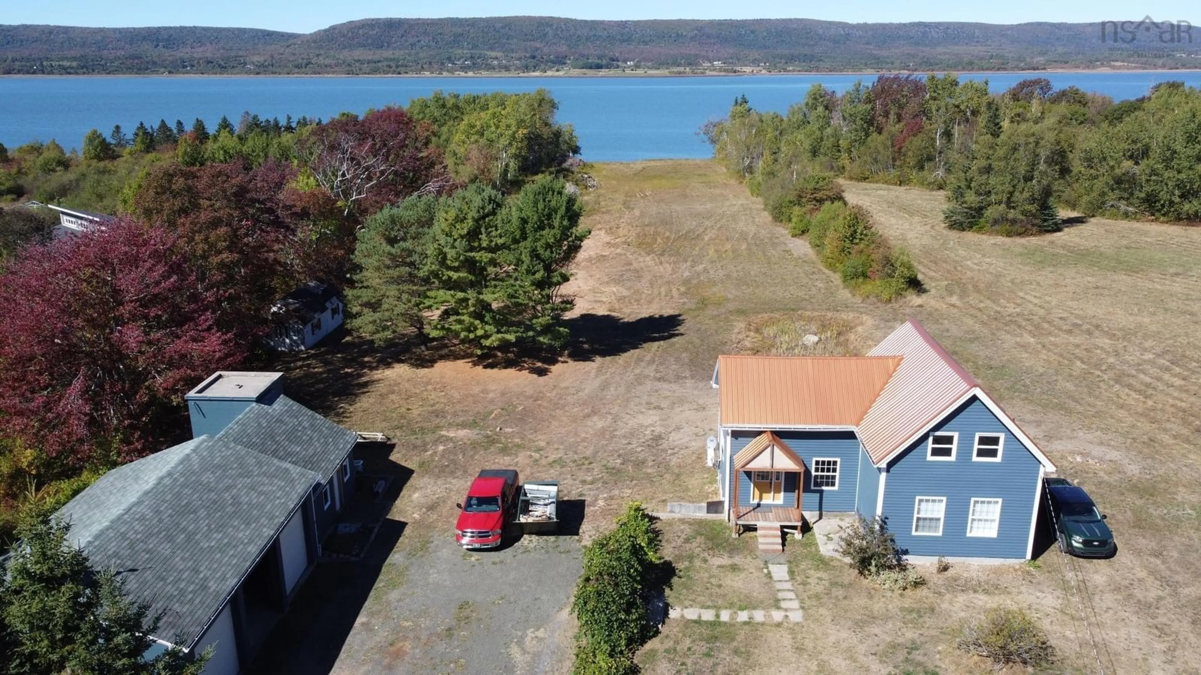 A pic from outside/outdoor area/front of a property/back of a property/a pic from drone, water/lake/river/ocean view for 2799 1 Hwy, Upper Clements Nova Scotia B0S 1A0