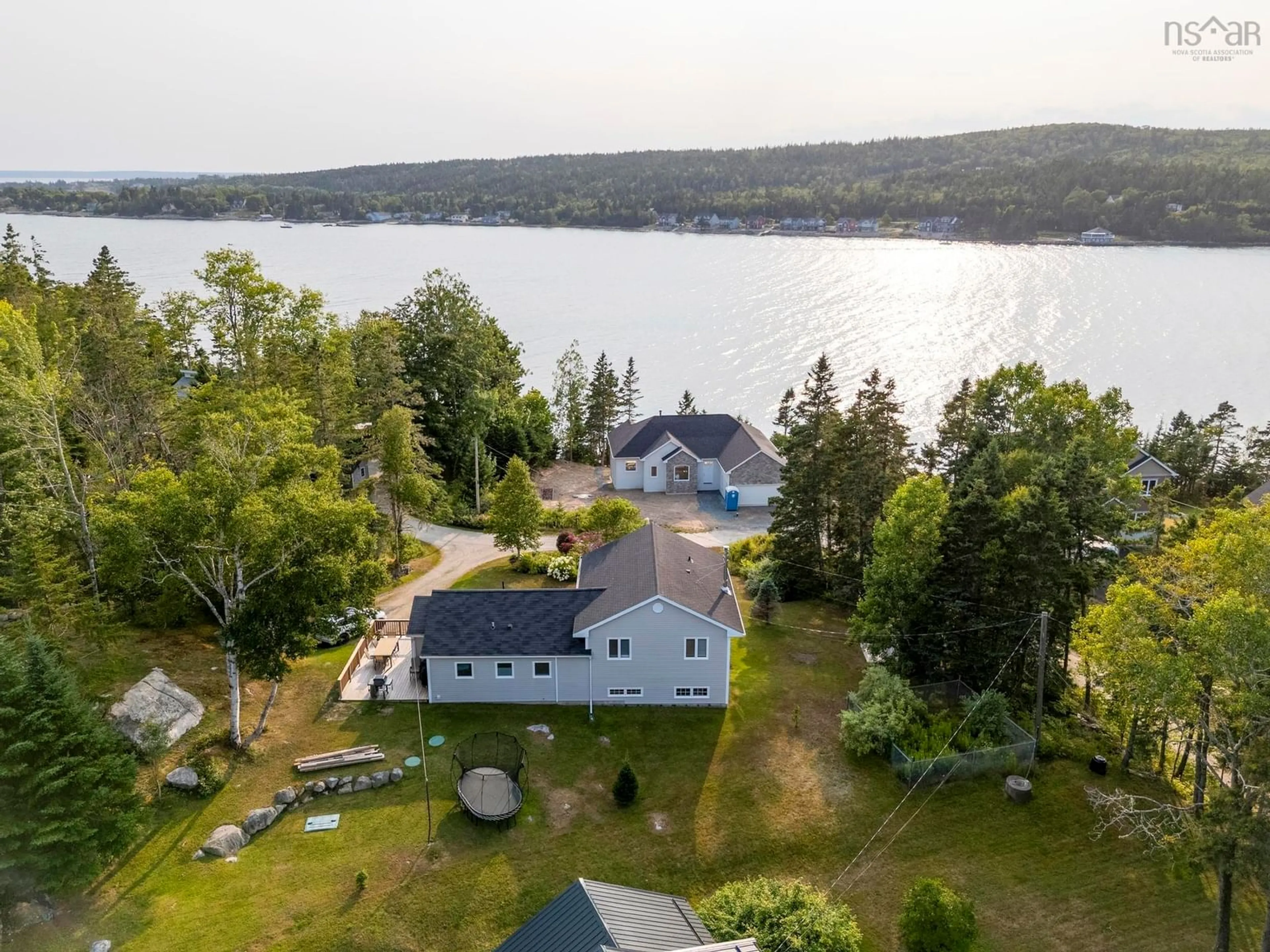 A pic from outside/outdoor area/front of a property/back of a property/a pic from drone, water/lake/river/ocean view for 20 Lerwick Lane, Boutiliers Point Nova Scotia B3Z 1T9