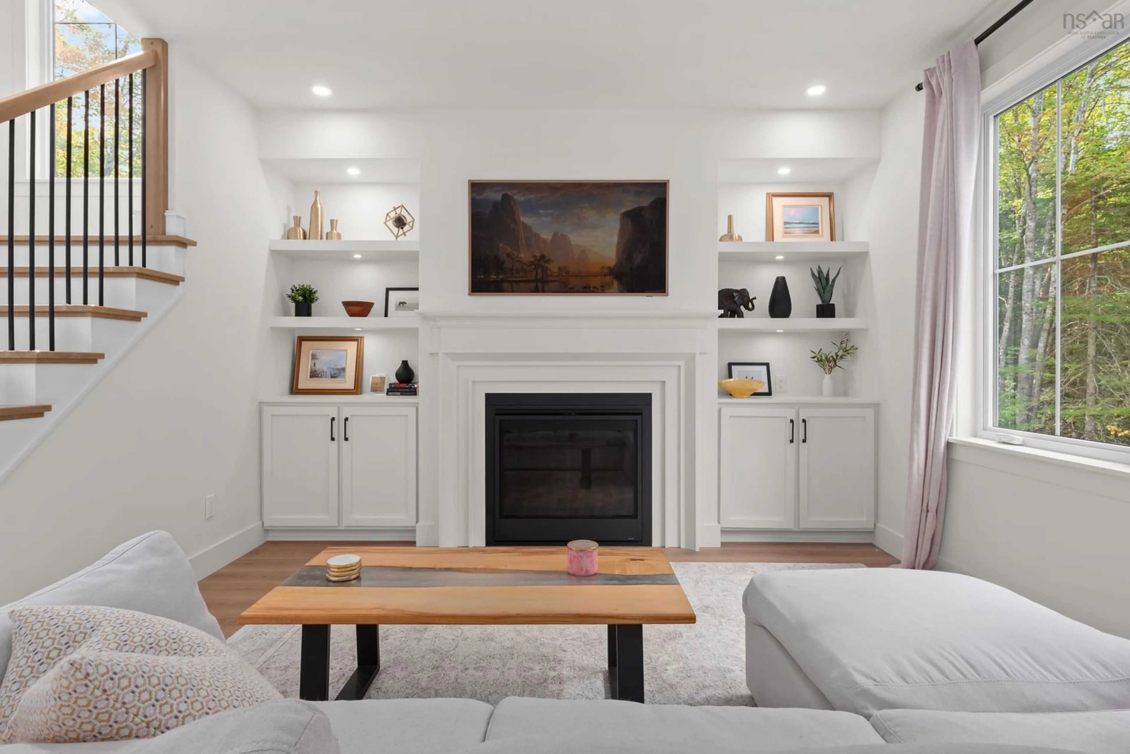 Living room with furniture, wood/laminate floor for 92 Double Lane, Oakfield Nova Scotia B2T 0W4