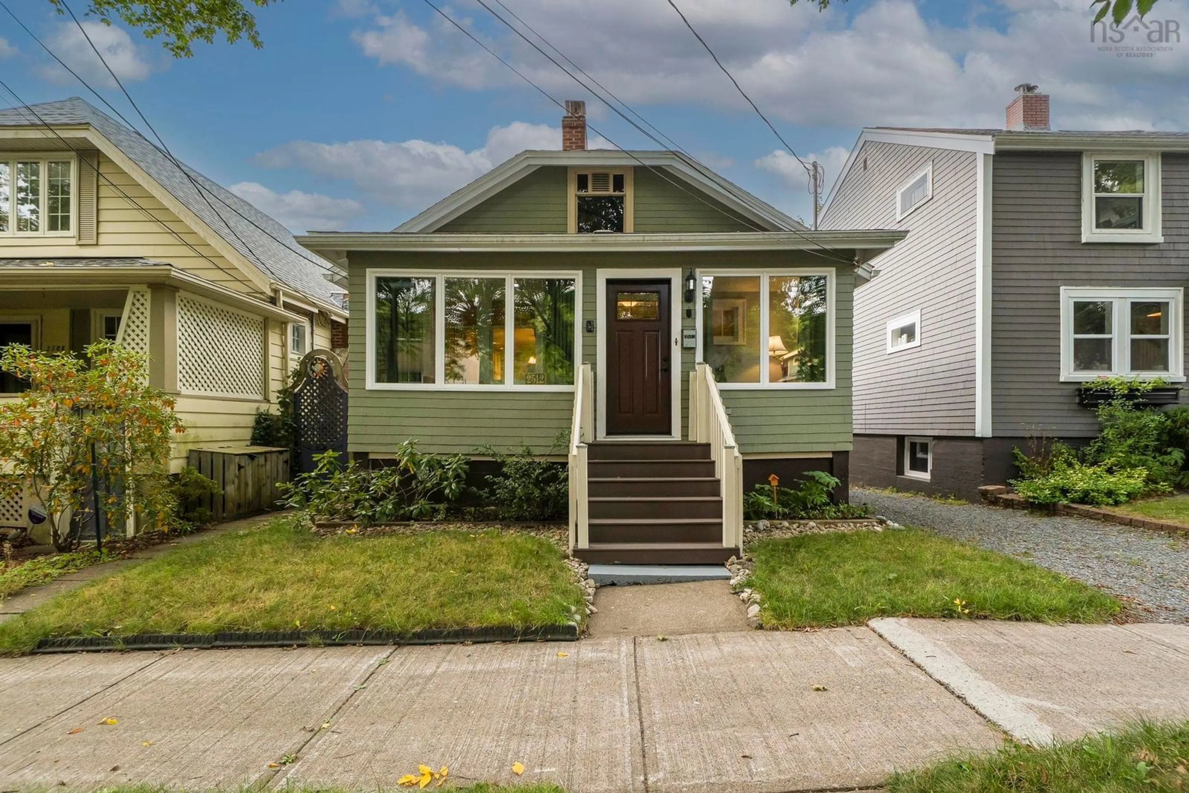 Home with vinyl exterior material, street for 2512 Poplar St, Halifax Nova Scotia B3L 2Y8