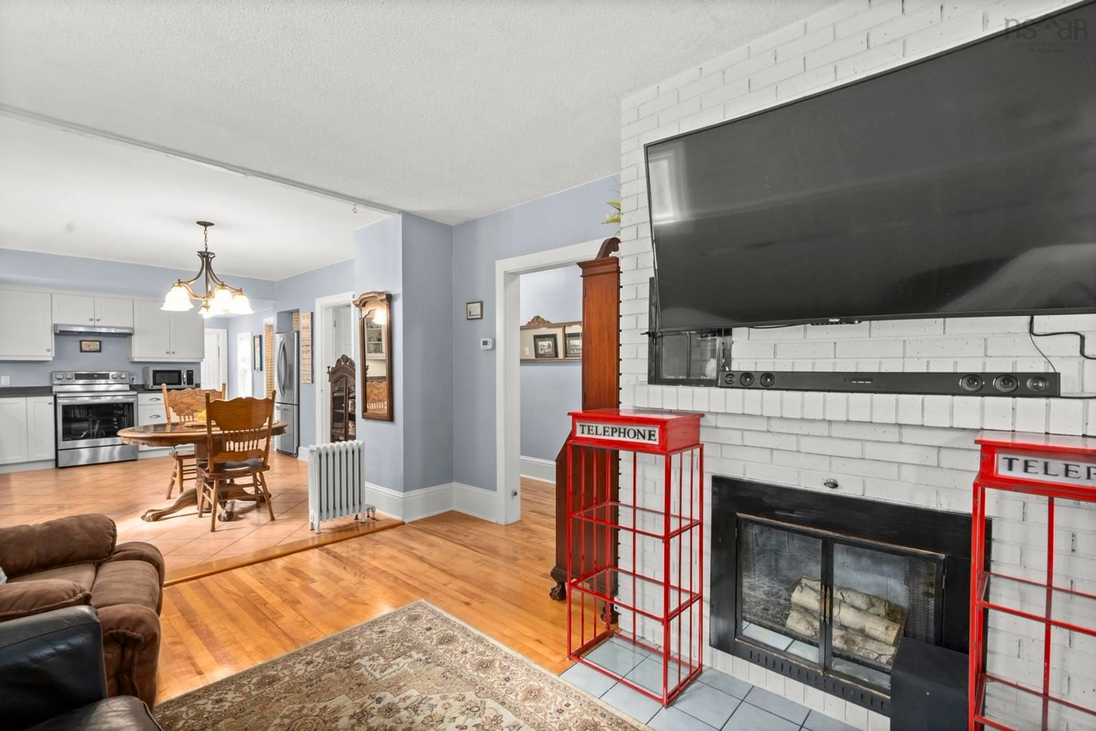 Living room with furniture, ceramic/tile floor for 2512 Poplar St, Halifax Nova Scotia B3L 2Y8