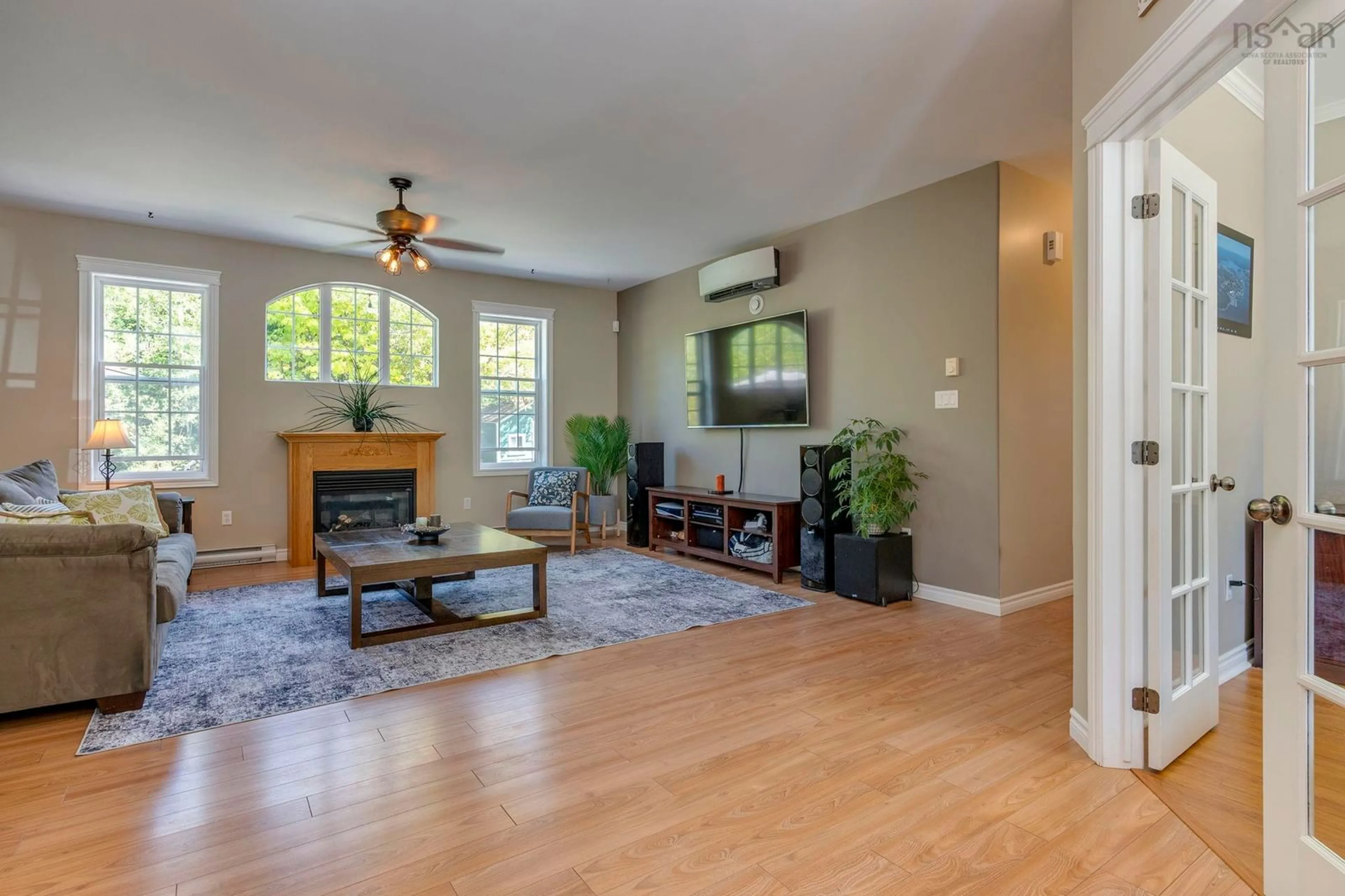 Living room with furniture, wood/laminate floor for 202 Mill Lake Rd, Hubbards Nova Scotia B0J 1T0