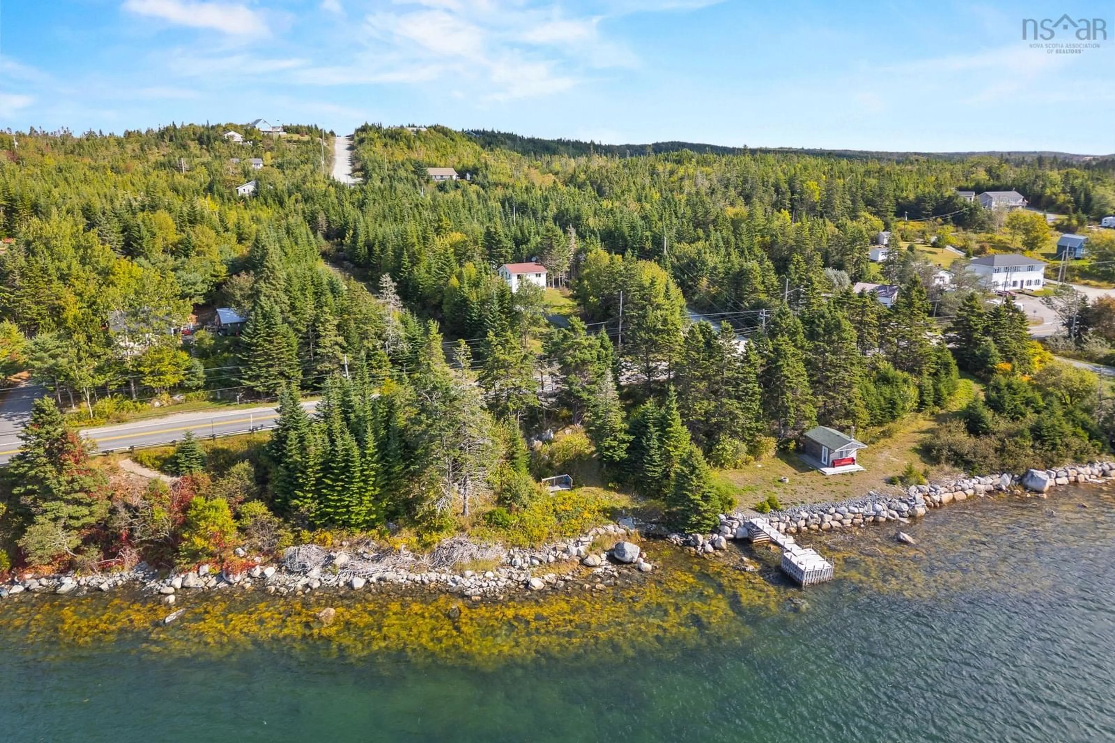 A pic from outside/outdoor area/front of a property/back of a property/a pic from drone, water/lake/river/ocean view for 10127 Highway 7, Salmon River Bridge Nova Scotia B0J 1W0