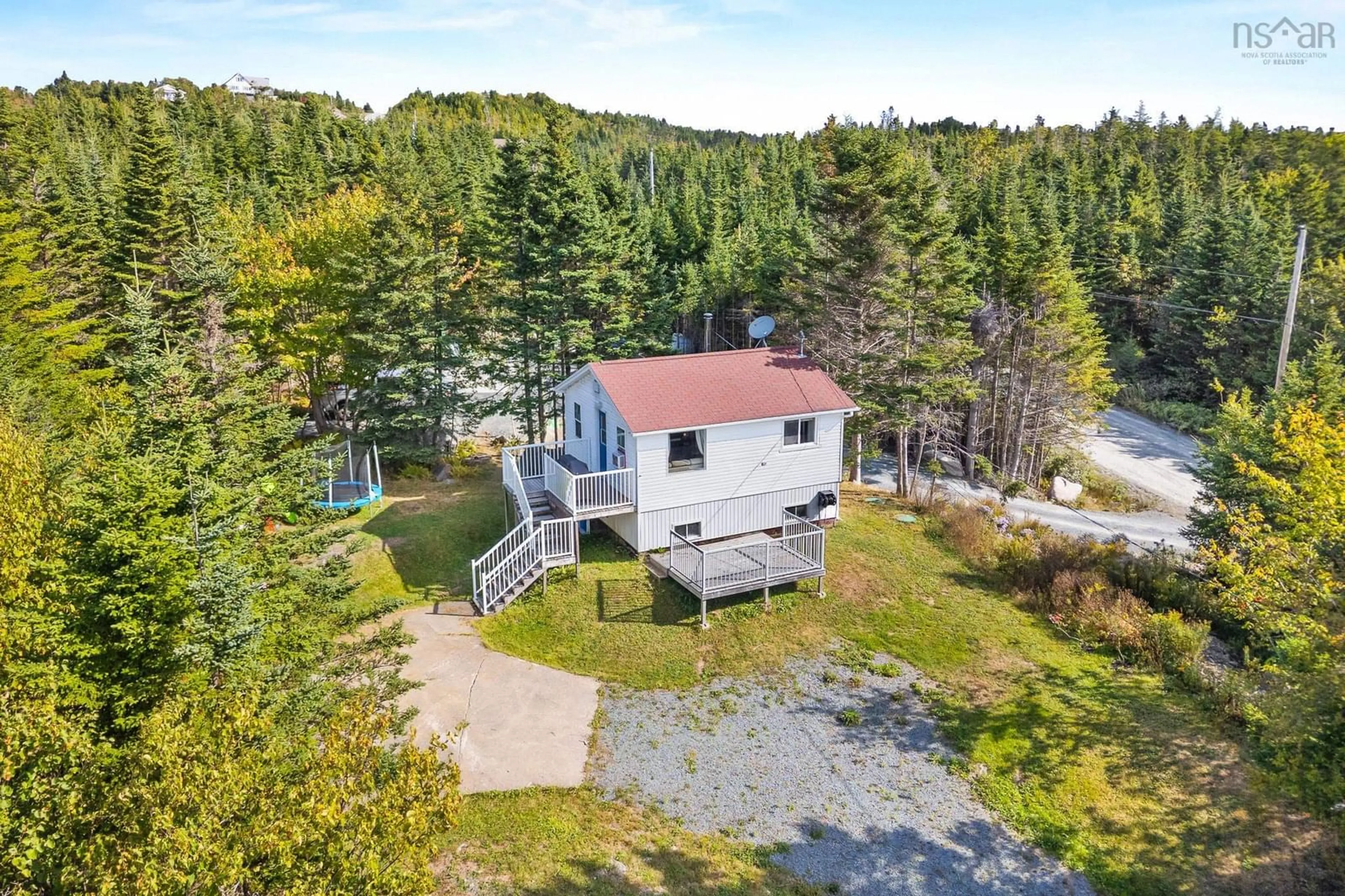 A pic from outside/outdoor area/front of a property/back of a property/a pic from drone, water/lake/river/ocean view for 10127 Highway 7, Salmon River Bridge Nova Scotia B0J 1W0