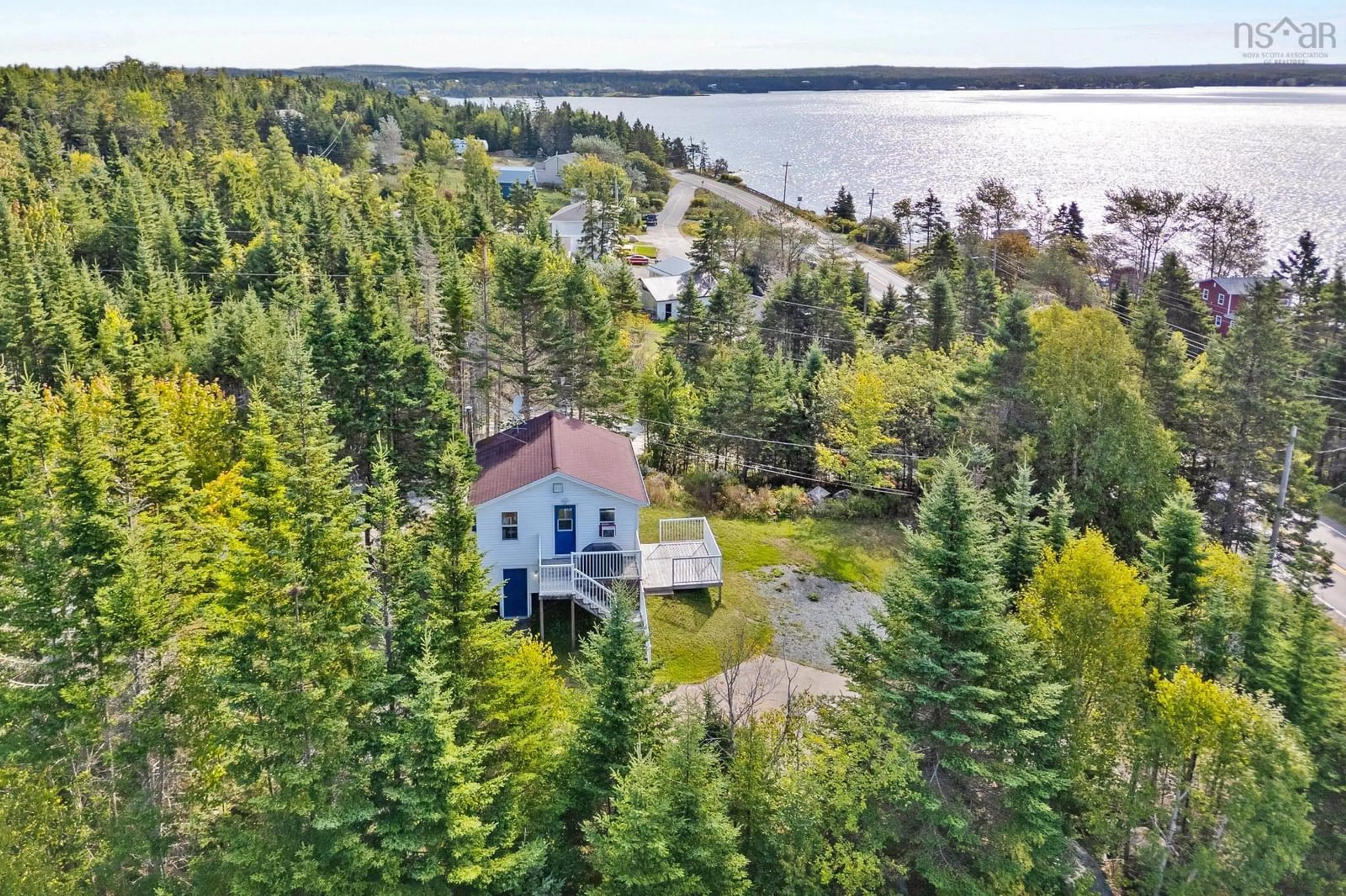 A pic from outside/outdoor area/front of a property/back of a property/a pic from drone, water/lake/river/ocean view for 10127 Highway 7, Salmon River Bridge Nova Scotia B0J 1W0