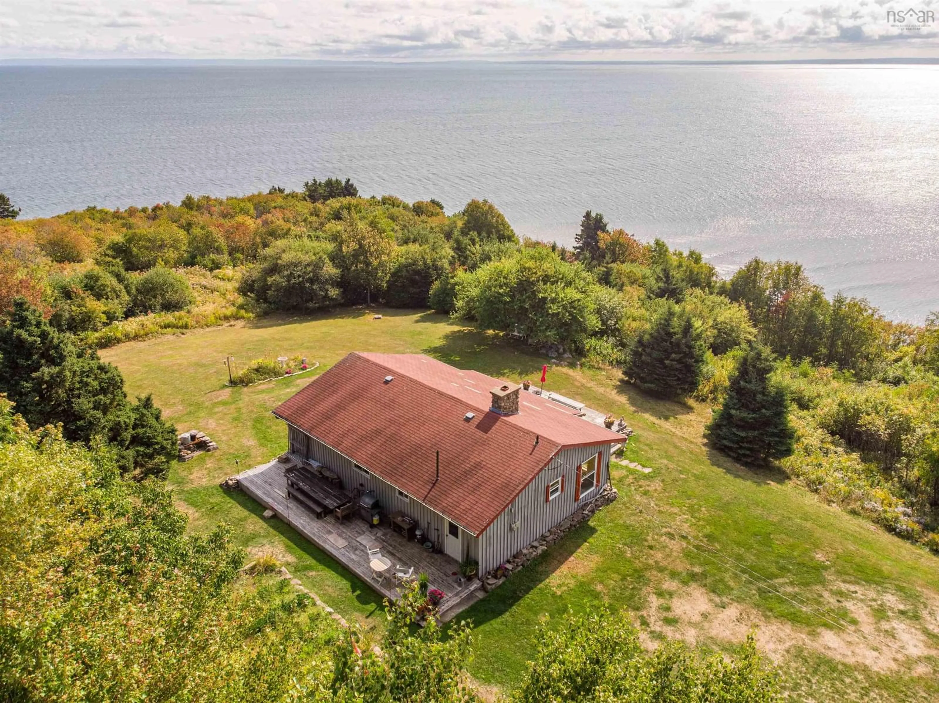 A pic from outside/outdoor area/front of a property/back of a property/a pic from drone, water/lake/river/ocean view for 80 Terag Lane, Lakevale, Ant. Co. N.S., Lakevale Nova Scotia B2G 2L2