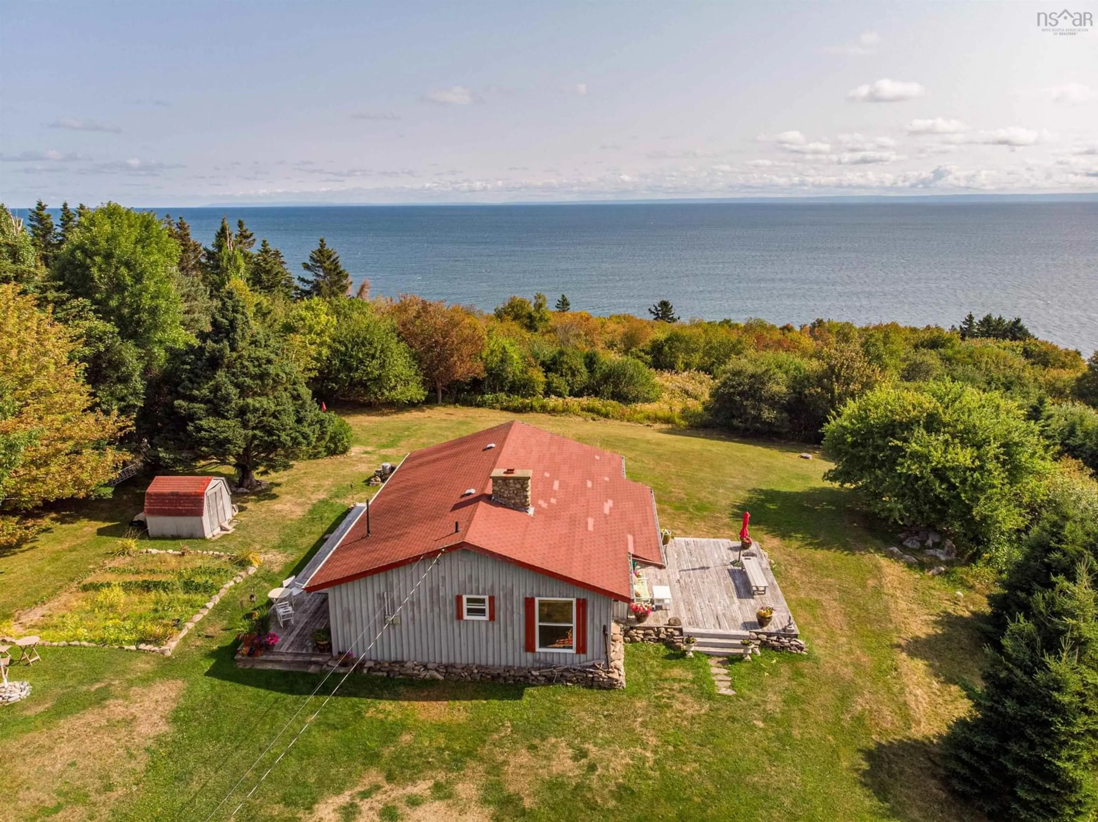 A pic from outside/outdoor area/front of a property/back of a property/a pic from drone, water/lake/river/ocean view for 80 Terag Lane, Lakevale, Ant. Co. N.S., Lakevale Nova Scotia B2G 2L2