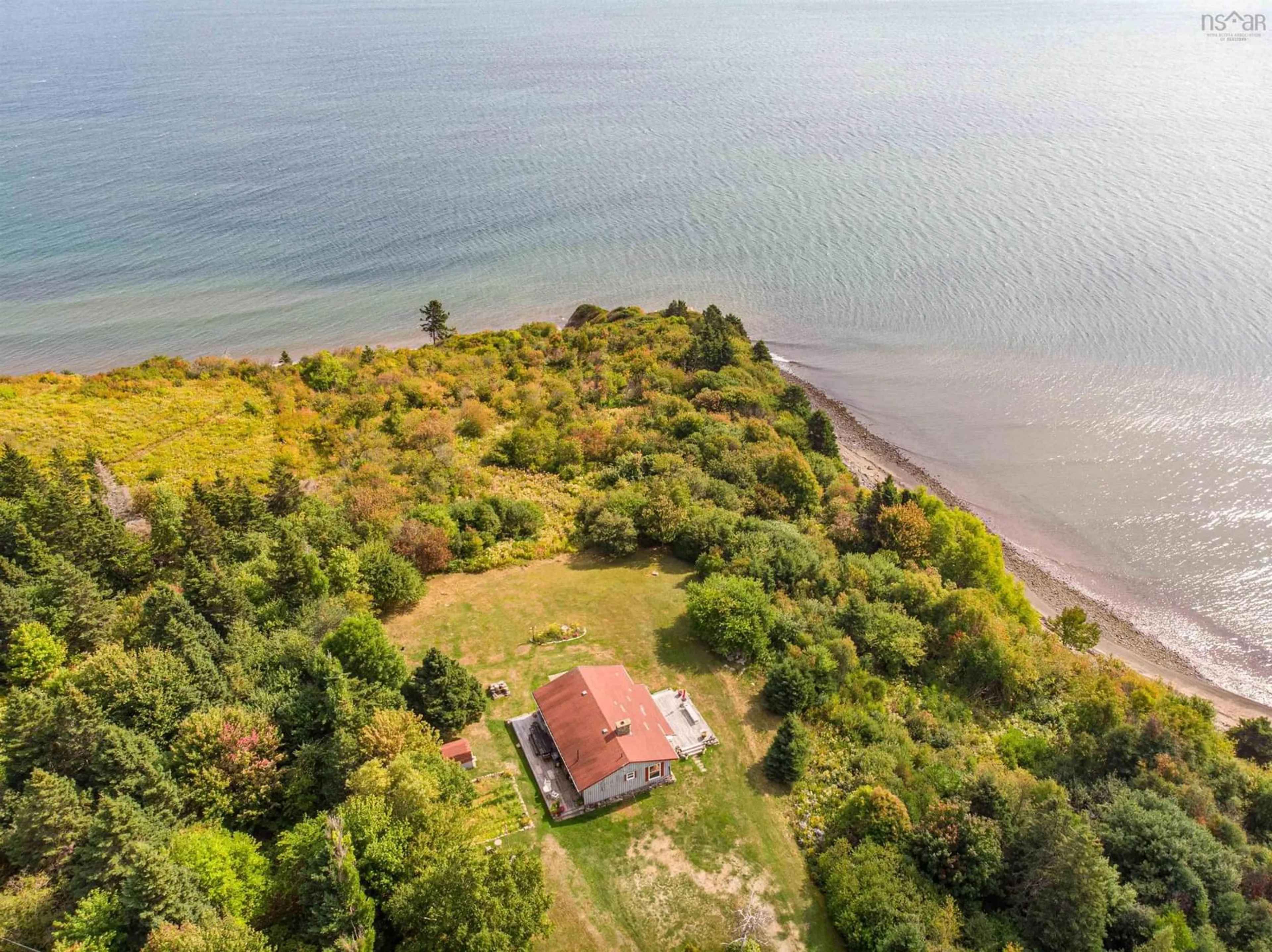 A pic from outside/outdoor area/front of a property/back of a property/a pic from drone, water/lake/river/ocean view for 80 Terag Lane, Lakevale, Ant. Co. N.S., Lakevale Nova Scotia B2G 2L2