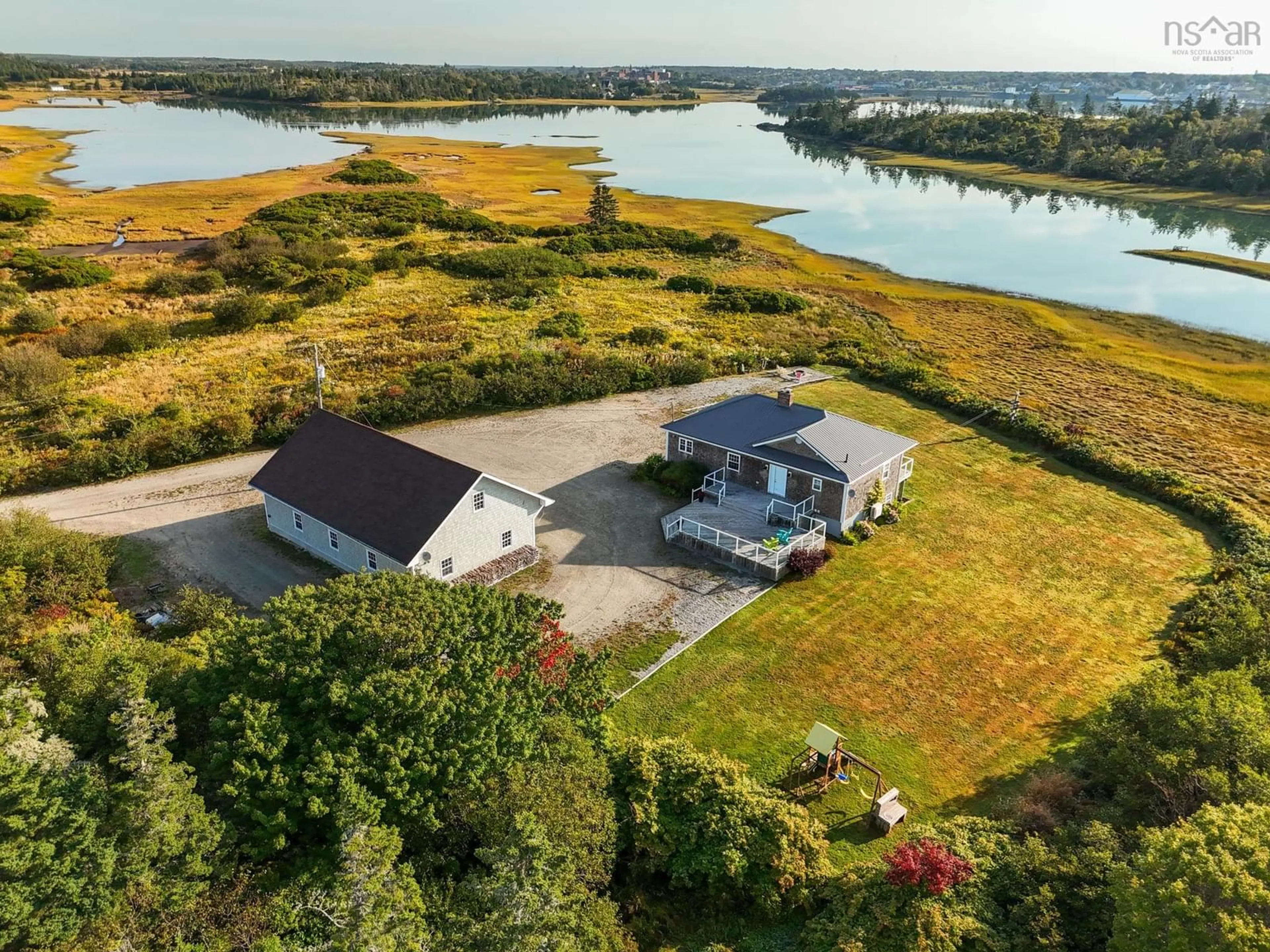 A pic from outside/outdoor area/front of a property/back of a property/a pic from drone, water/lake/river/ocean view for 633 Highway 304, Overton Nova Scotia B5A 5G6