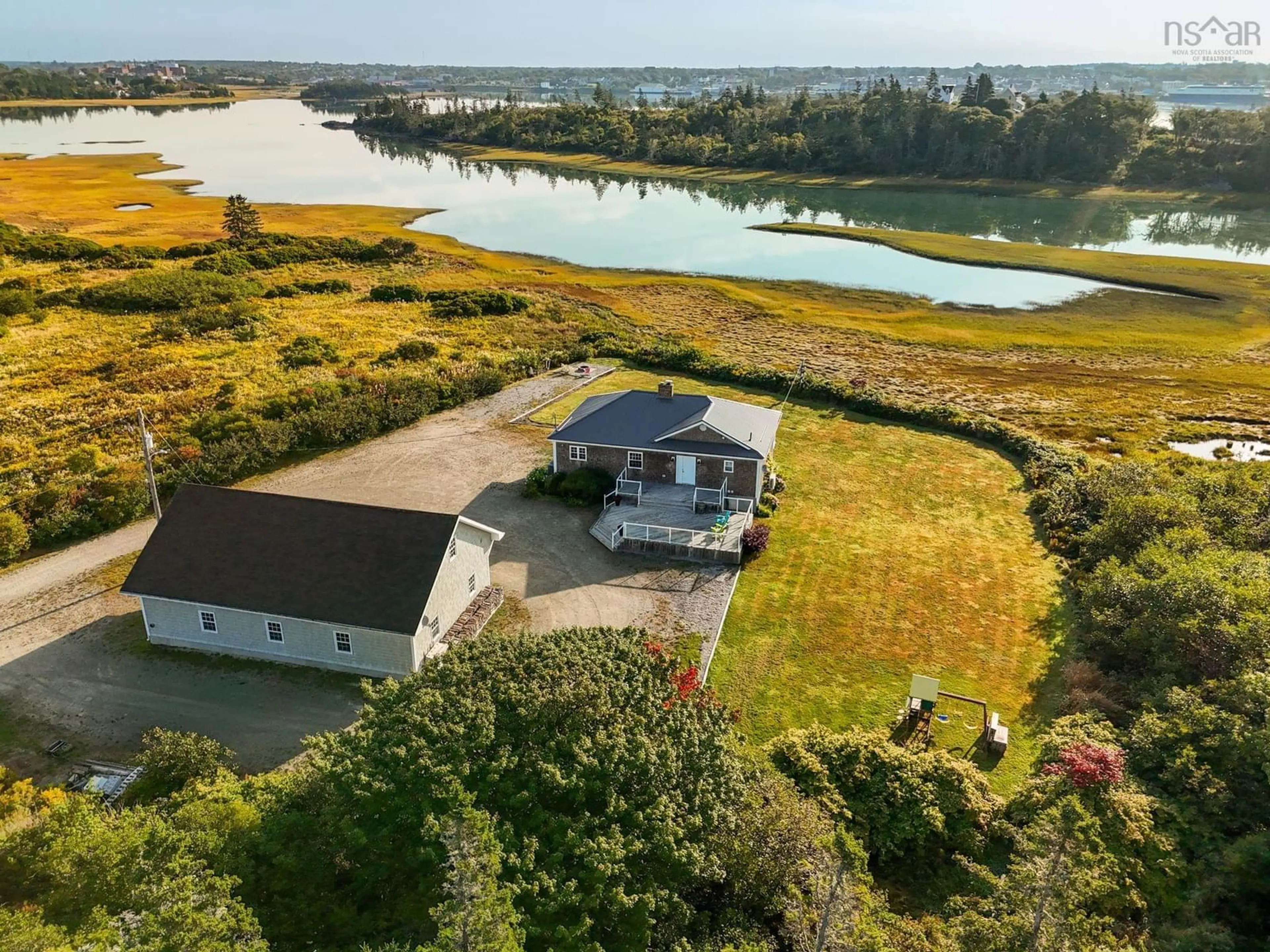 A pic from outside/outdoor area/front of a property/back of a property/a pic from drone, water/lake/river/ocean view for 633 Highway 304, Overton Nova Scotia B5A 5G6