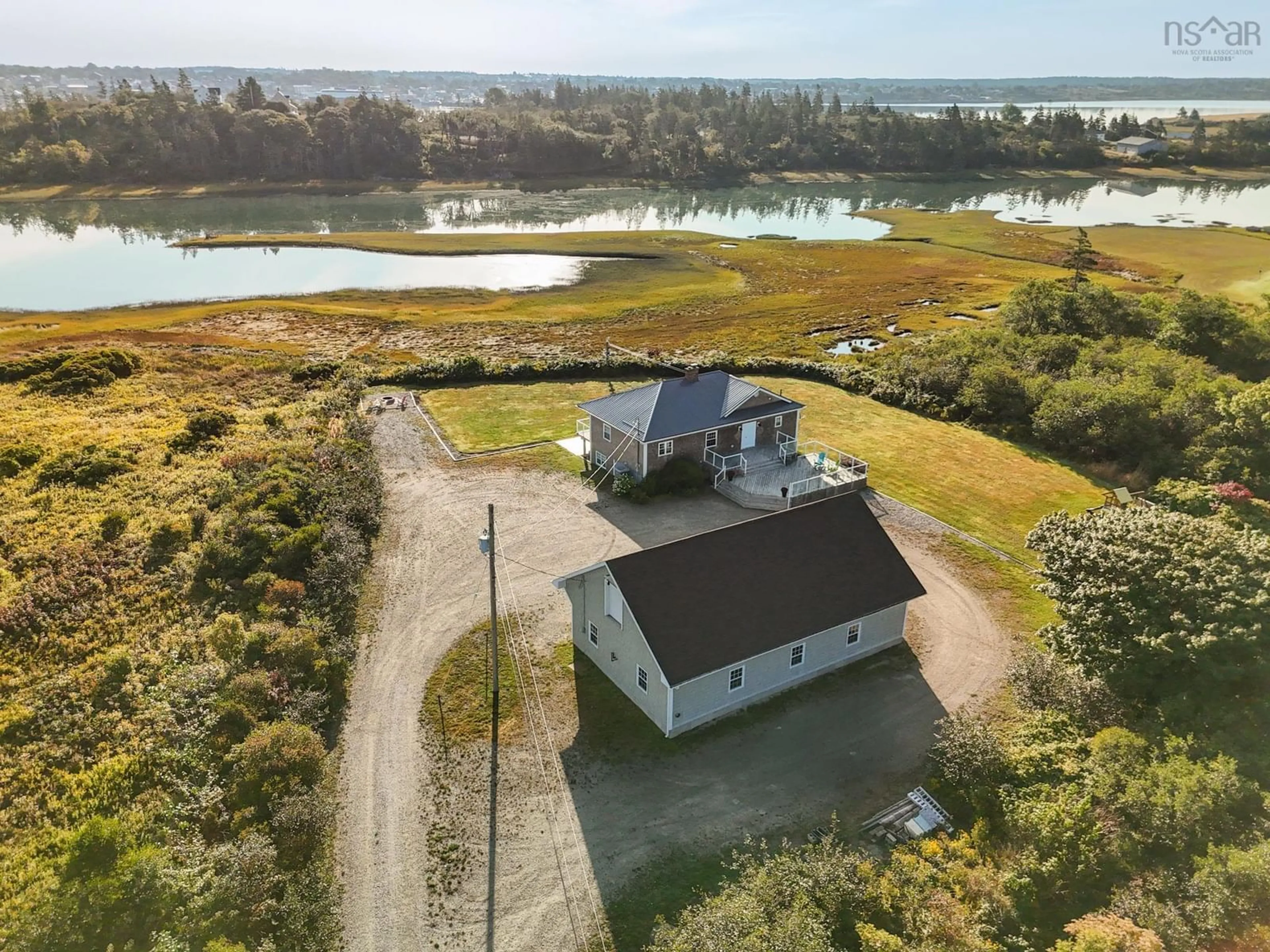 A pic from outside/outdoor area/front of a property/back of a property/a pic from drone, water/lake/river/ocean view for 633 Highway 304, Overton Nova Scotia B5A 5G6