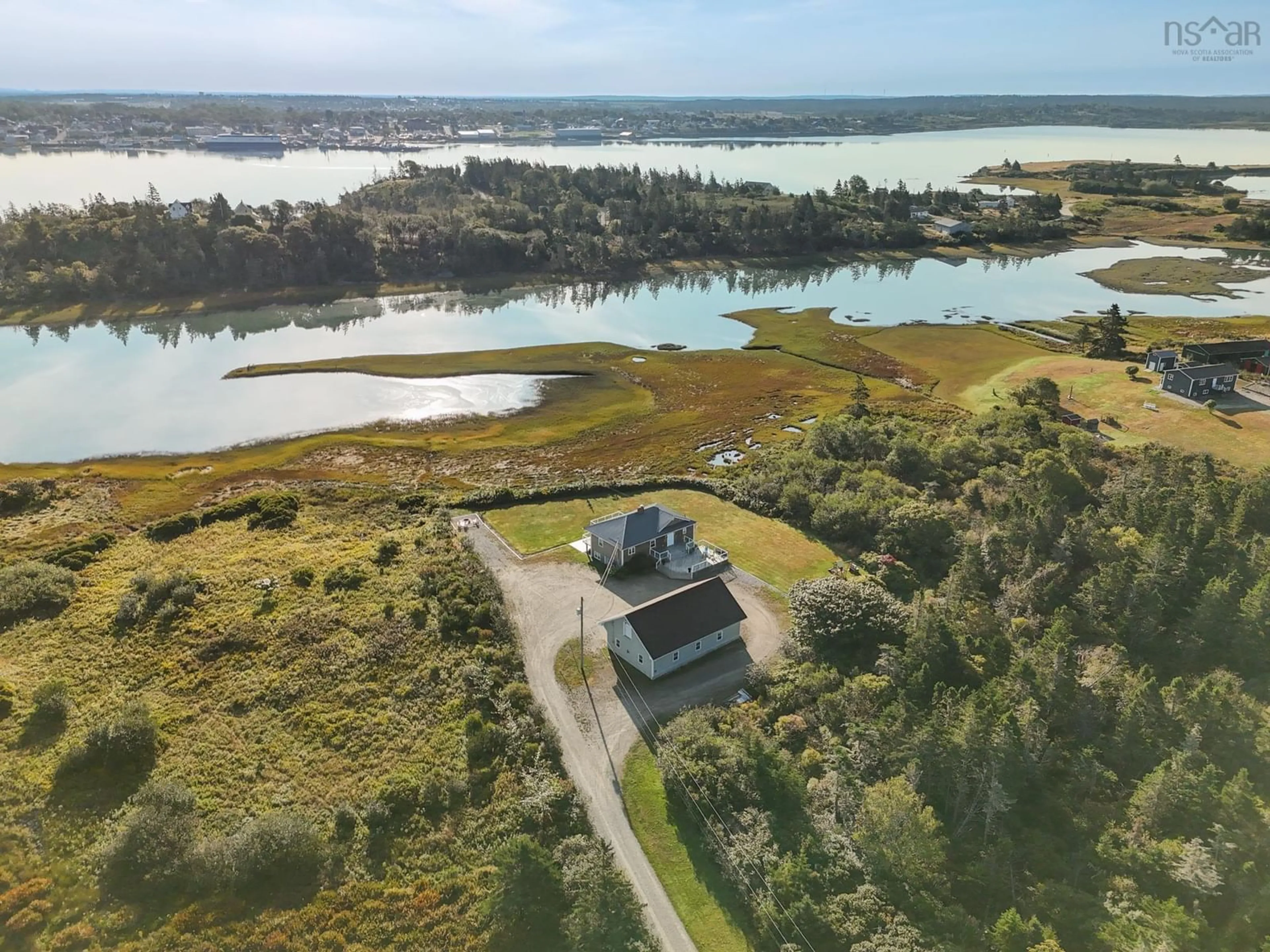 A pic from outside/outdoor area/front of a property/back of a property/a pic from drone, water/lake/river/ocean view for 633 Highway 304, Overton Nova Scotia B5A 5G6