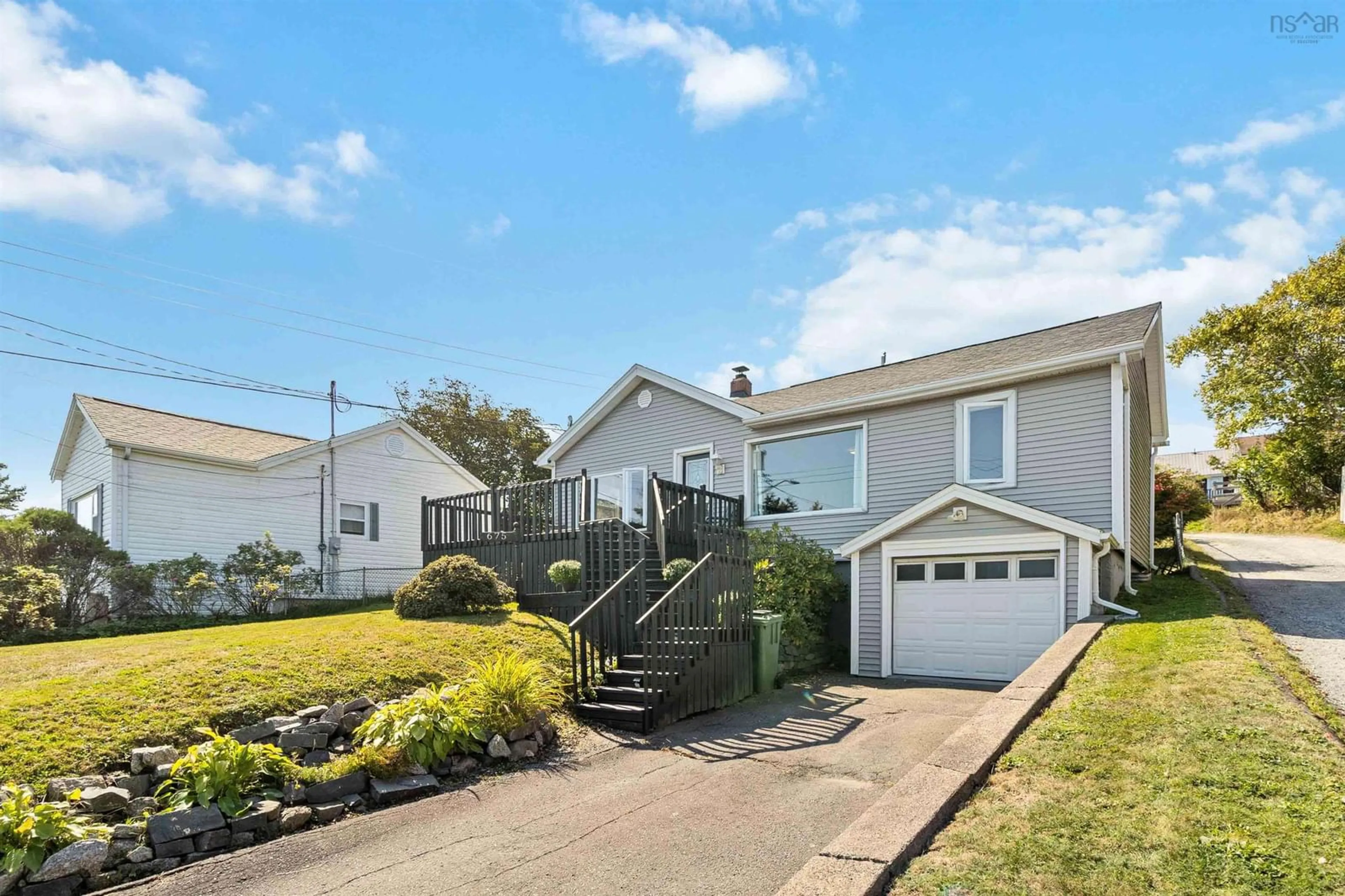 Home with vinyl exterior material, street for 675 Ketch Harbour Rd, Portuguese Cove Nova Scotia B3V 1K2