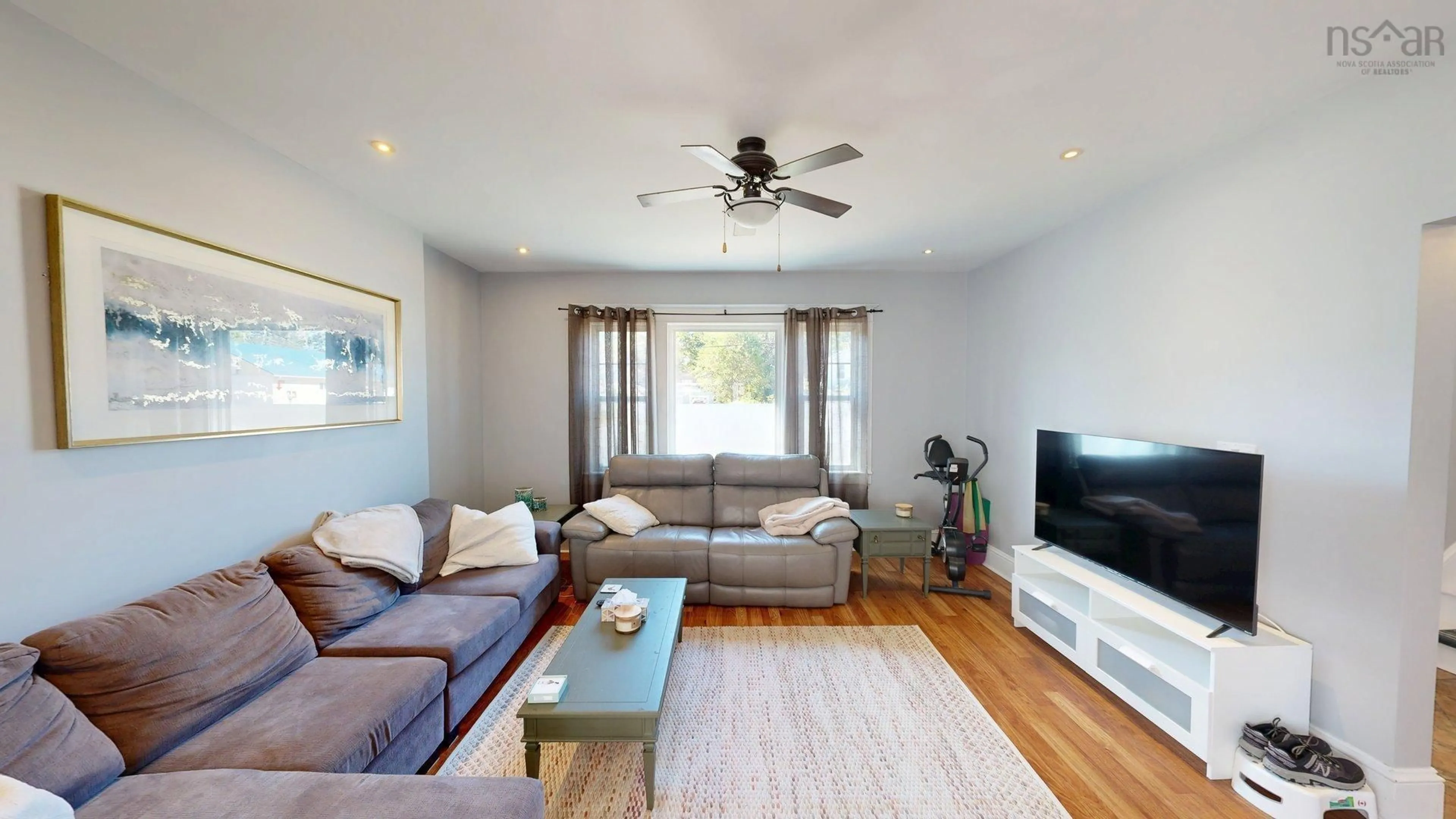 Living room with furniture, wood/laminate floor for 1518/1520 Bridge Street, Kingston Nova Scotia B0P 1R0