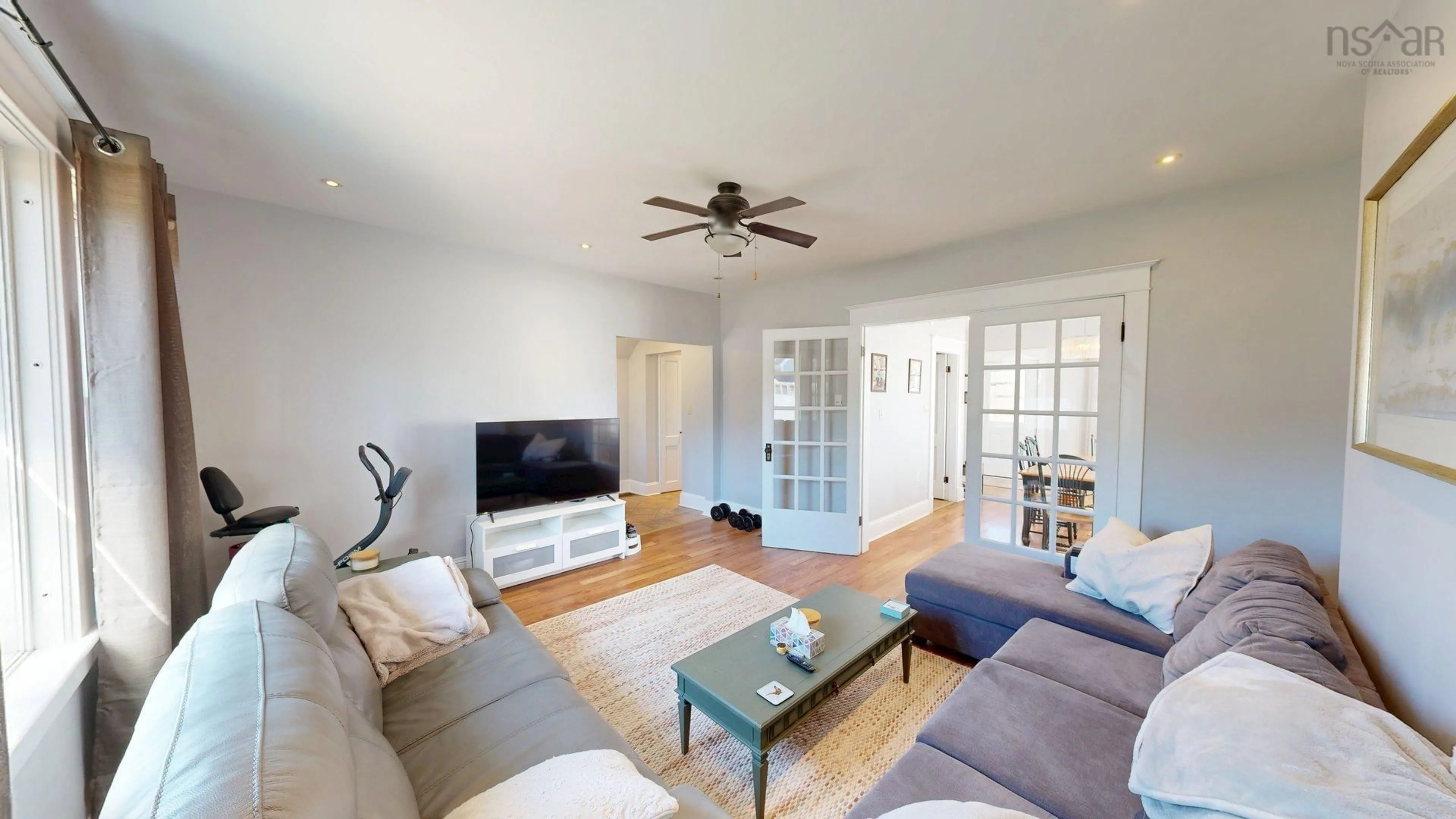 Living room with furniture, wood/laminate floor for 1518/1520 Bridge Street, Kingston Nova Scotia B0P 1R0