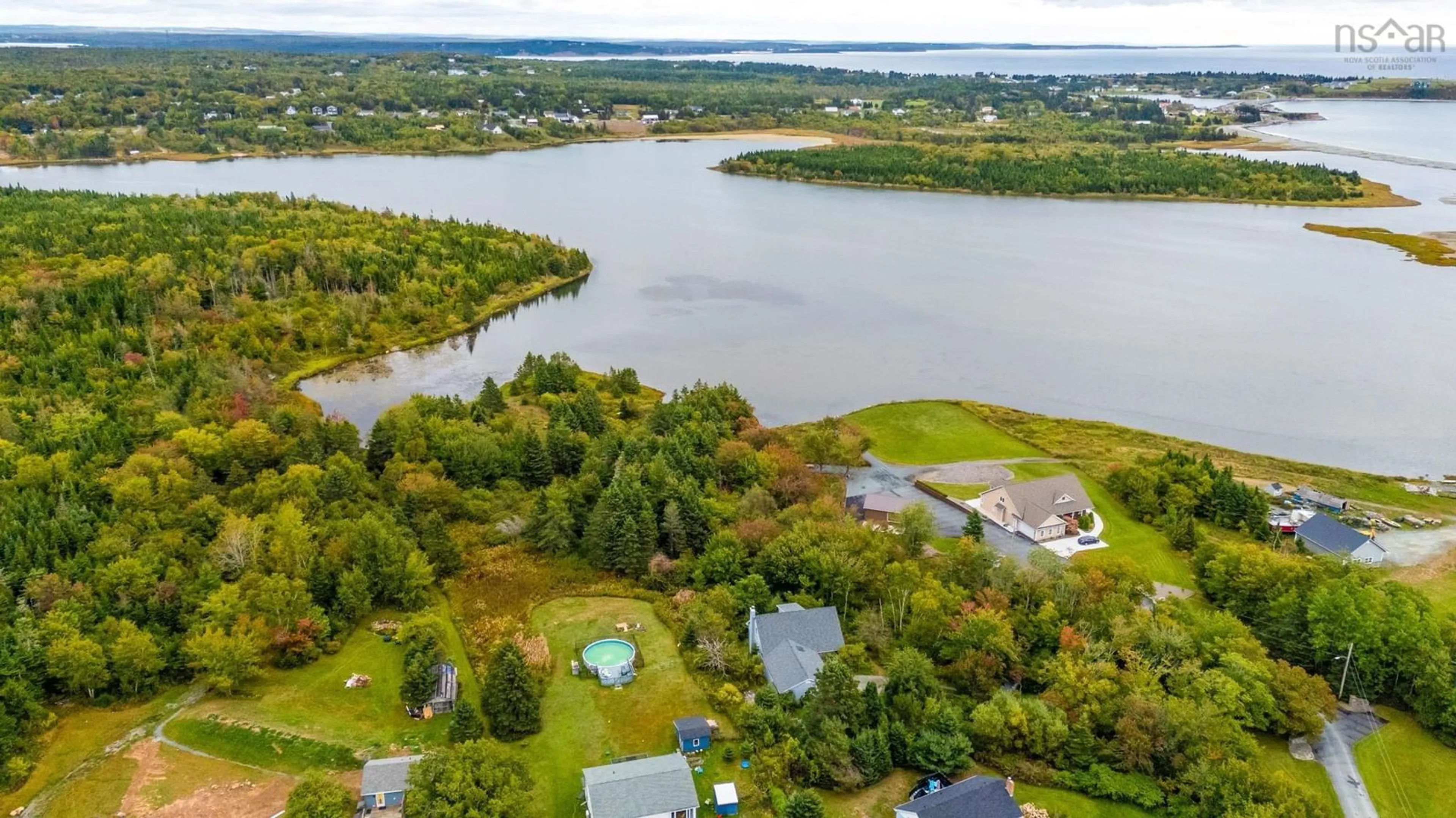 A pic from outside/outdoor area/front of a property/back of a property/a pic from drone, water/lake/river/ocean view for 70 Hurricane Lane, Eastern Passage Nova Scotia B3G 1S3