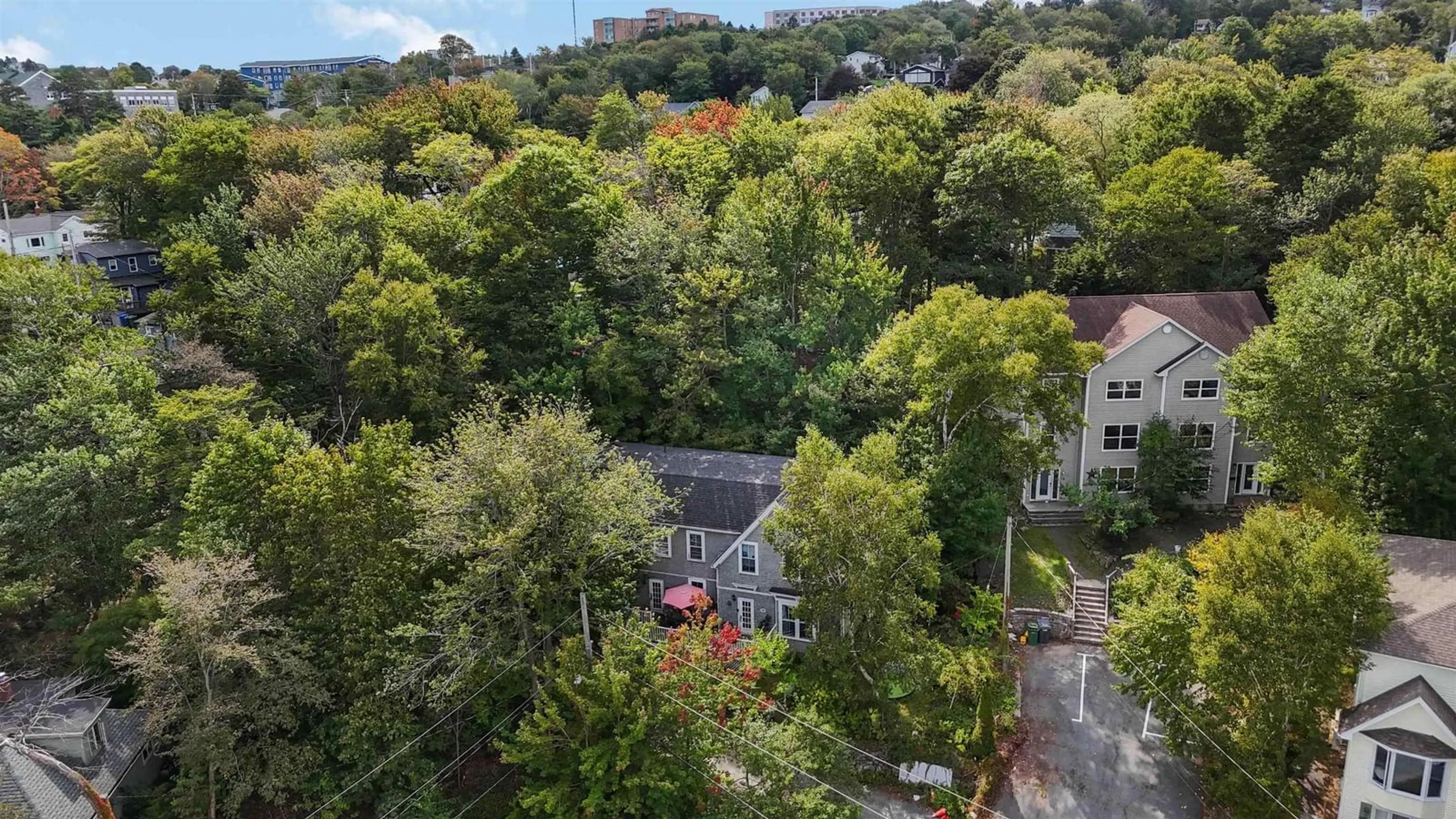 A pic from outside/outdoor area/front of a property/back of a property/a pic from drone, city buildings view from balcony for 24 Northumberland Lane, Halifax Nova Scotia B3M 1R7