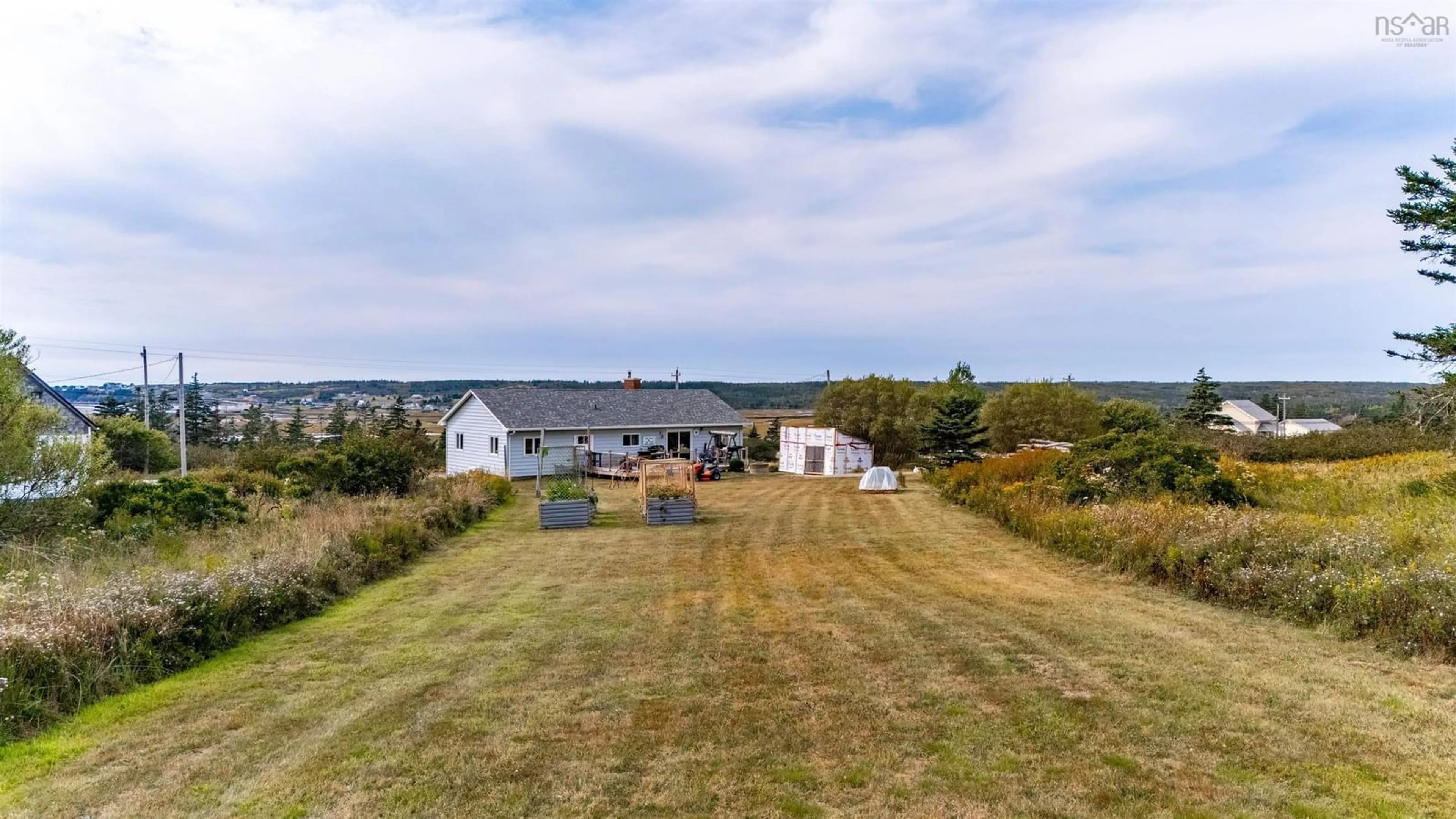 A pic from outside/outdoor area/front of a property/back of a property/a pic from drone, water/lake/river/ocean view for 5844 1 Hwy, Mavillette Nova Scotia B5A 5B3
