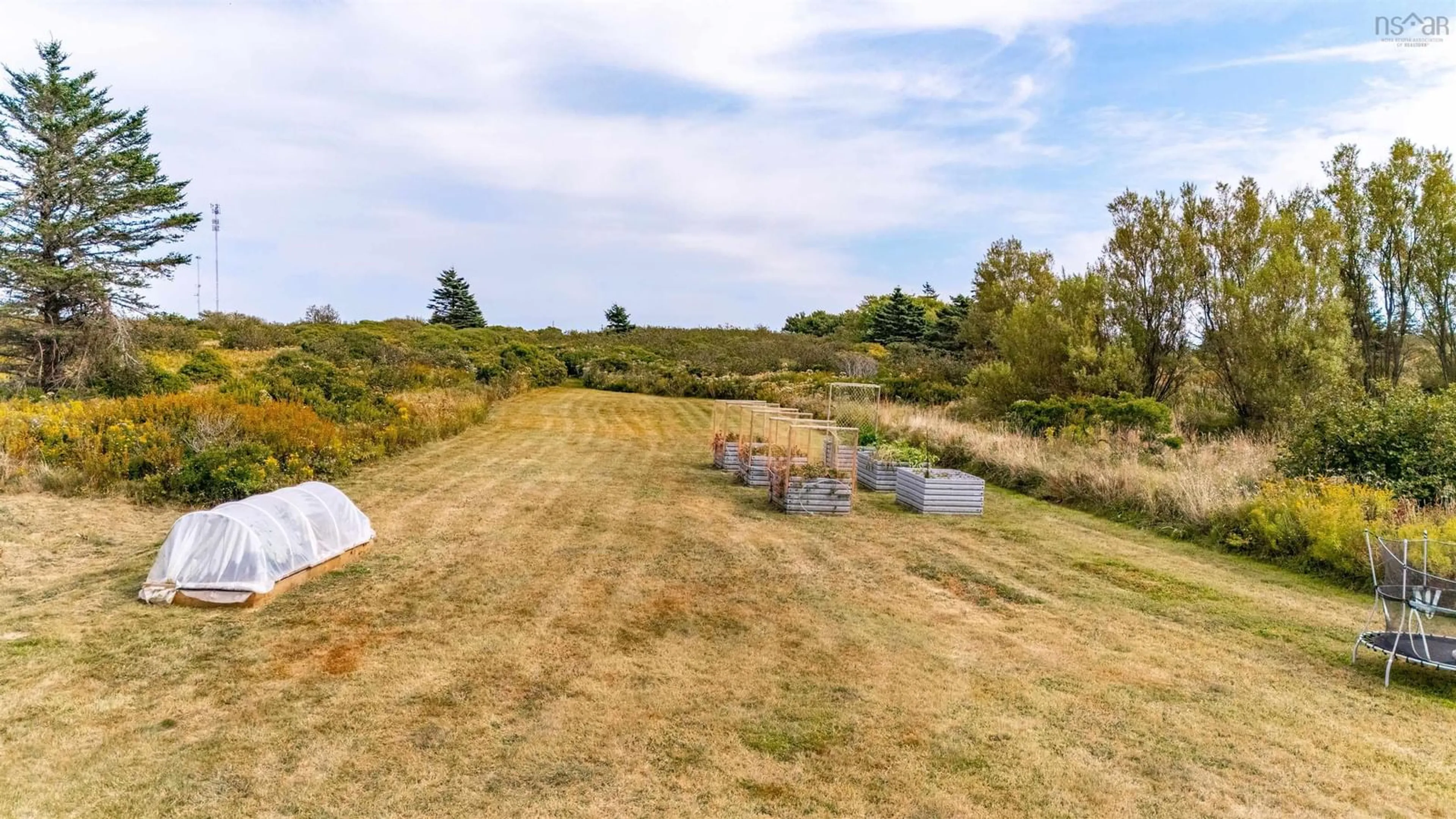 A pic from outside/outdoor area/front of a property/back of a property/a pic from drone, water/lake/river/ocean view for 5844 1 Hwy, Mavillette Nova Scotia B5A 5B3