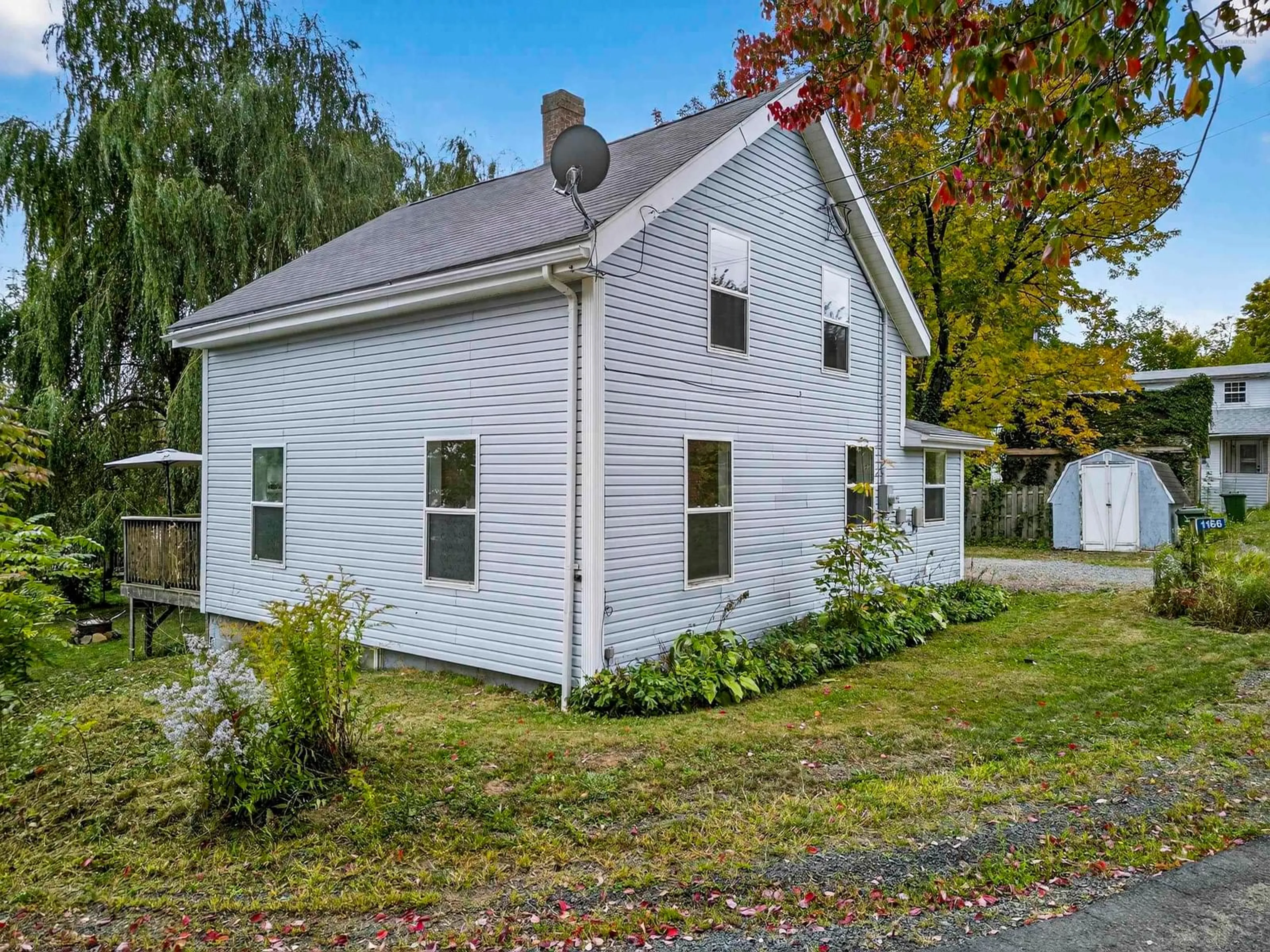 Home with vinyl exterior material, street for 1166 Bigelow Street, Canning Nova Scotia B0P 1H0