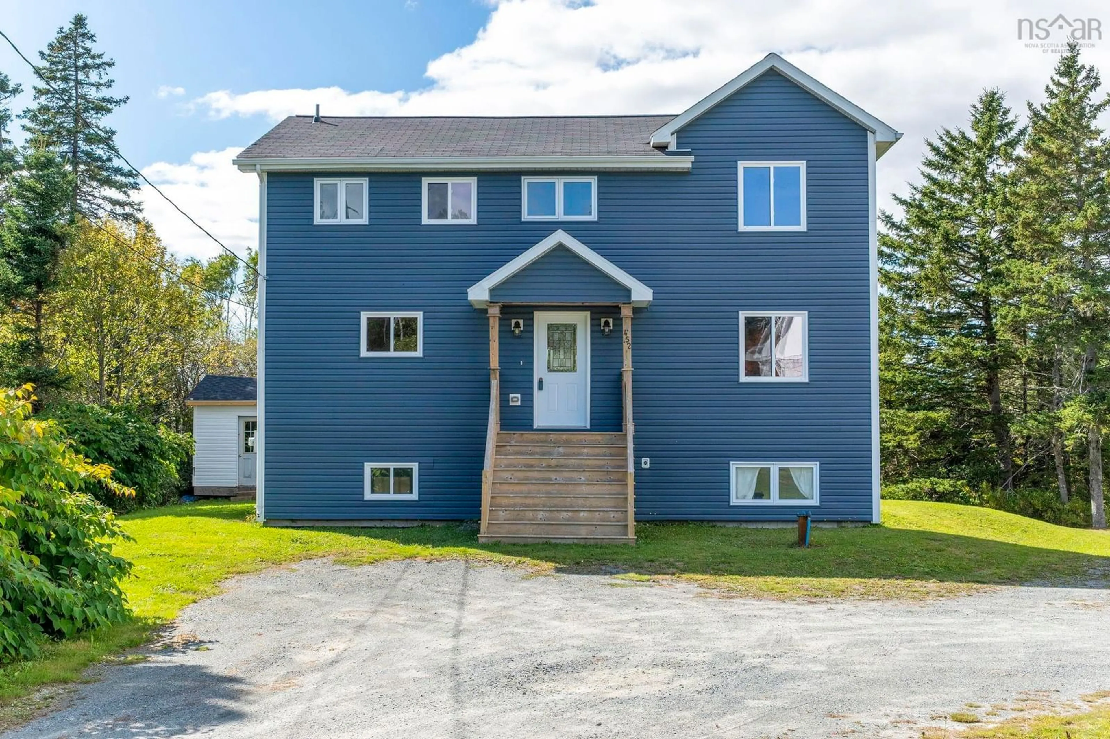 Home with vinyl exterior material, street for 452 East Chezzetcook Rd, East Chezzetcook Nova Scotia B0J 2L0