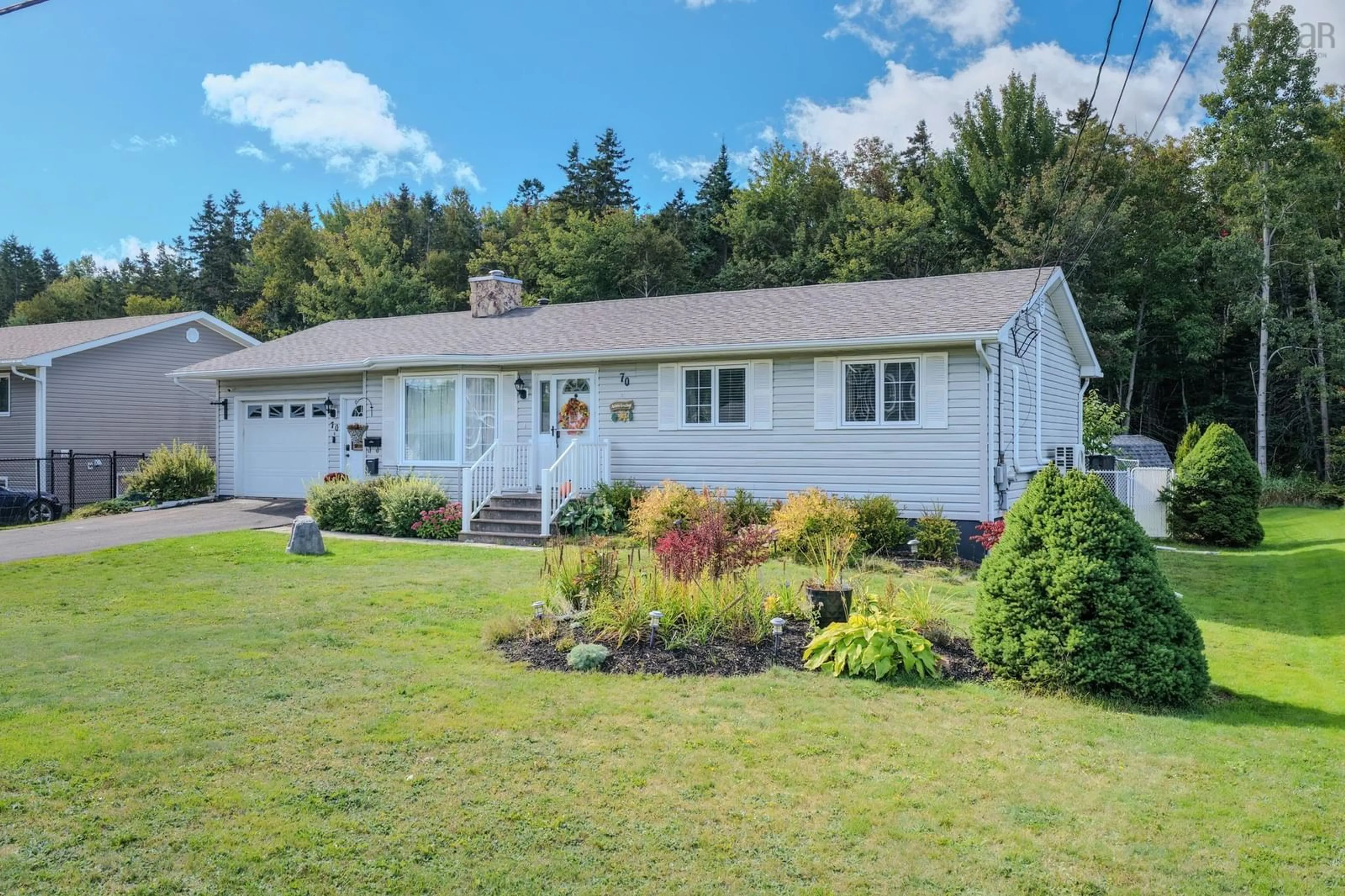 Home with vinyl exterior material, street for 70 Ranni Cres, Sydney River Nova Scotia B1S 3E2