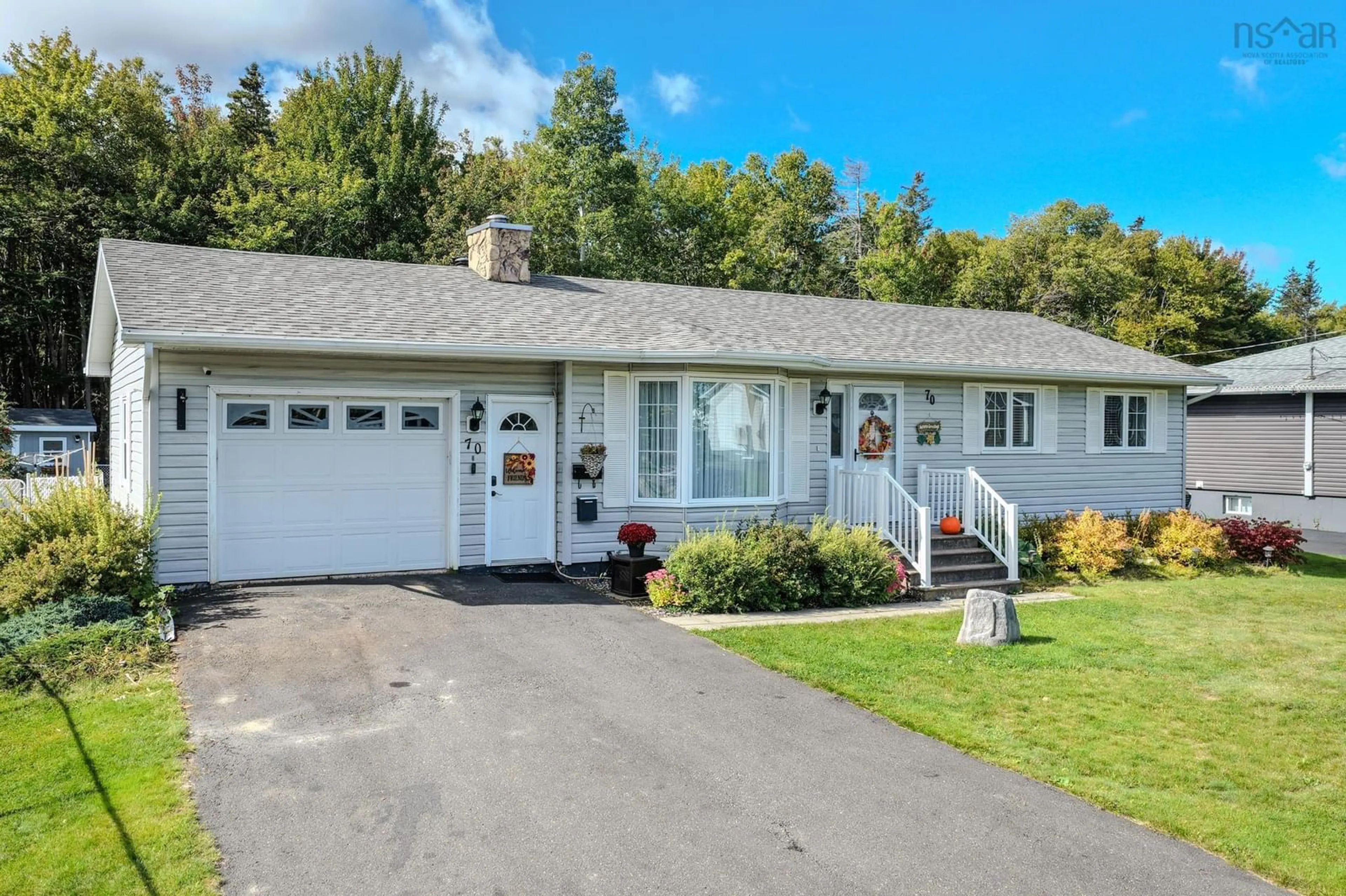 Home with vinyl exterior material, street for 70 Ranni Cres, Sydney River Nova Scotia B1S 3E2