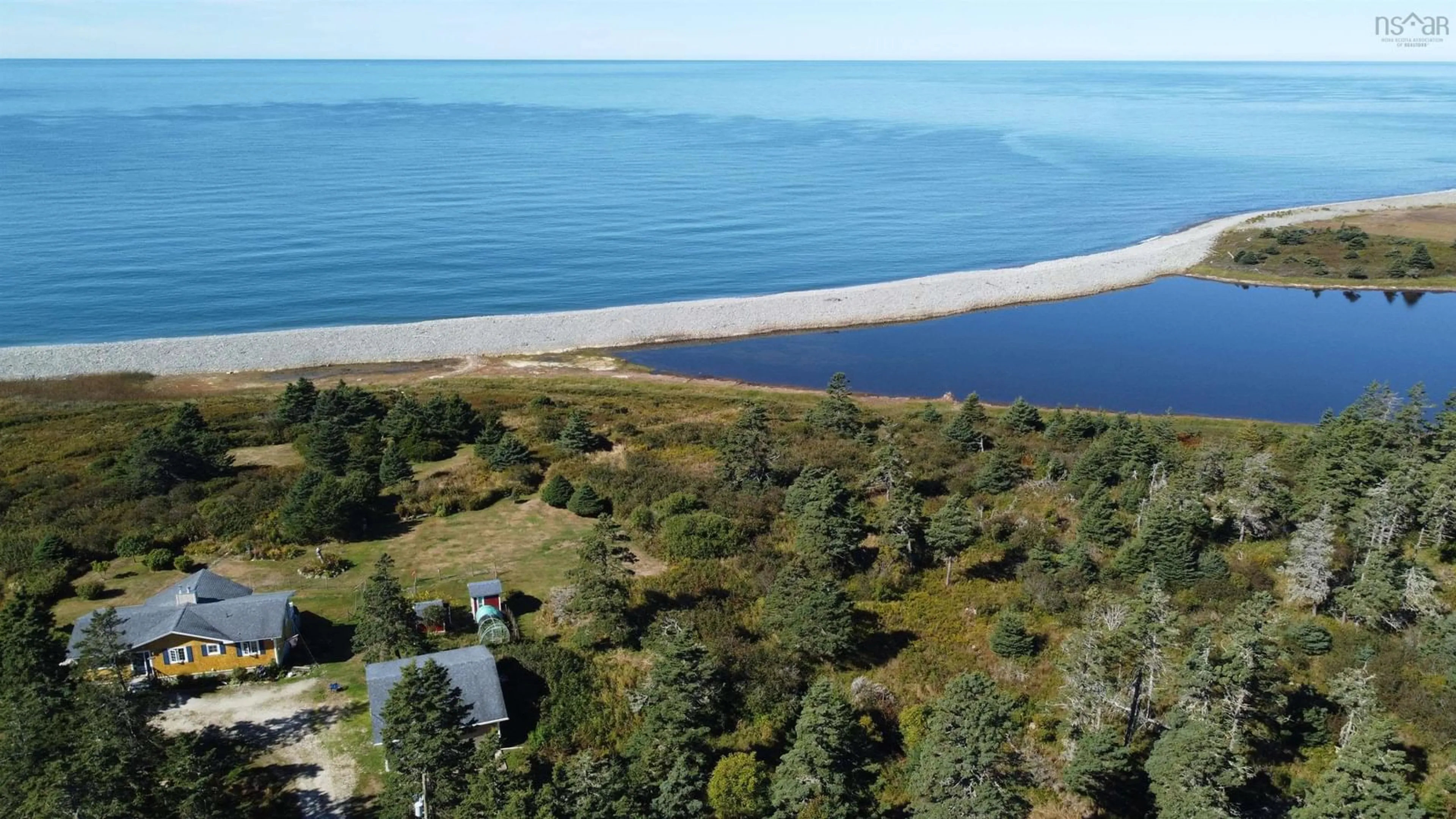 A pic from outside/outdoor area/front of a property/back of a property/a pic from drone, water/lake/river/ocean view for 2815 Main Shore Road Rd, Port Maitland Nova Scotia B5A 5C4