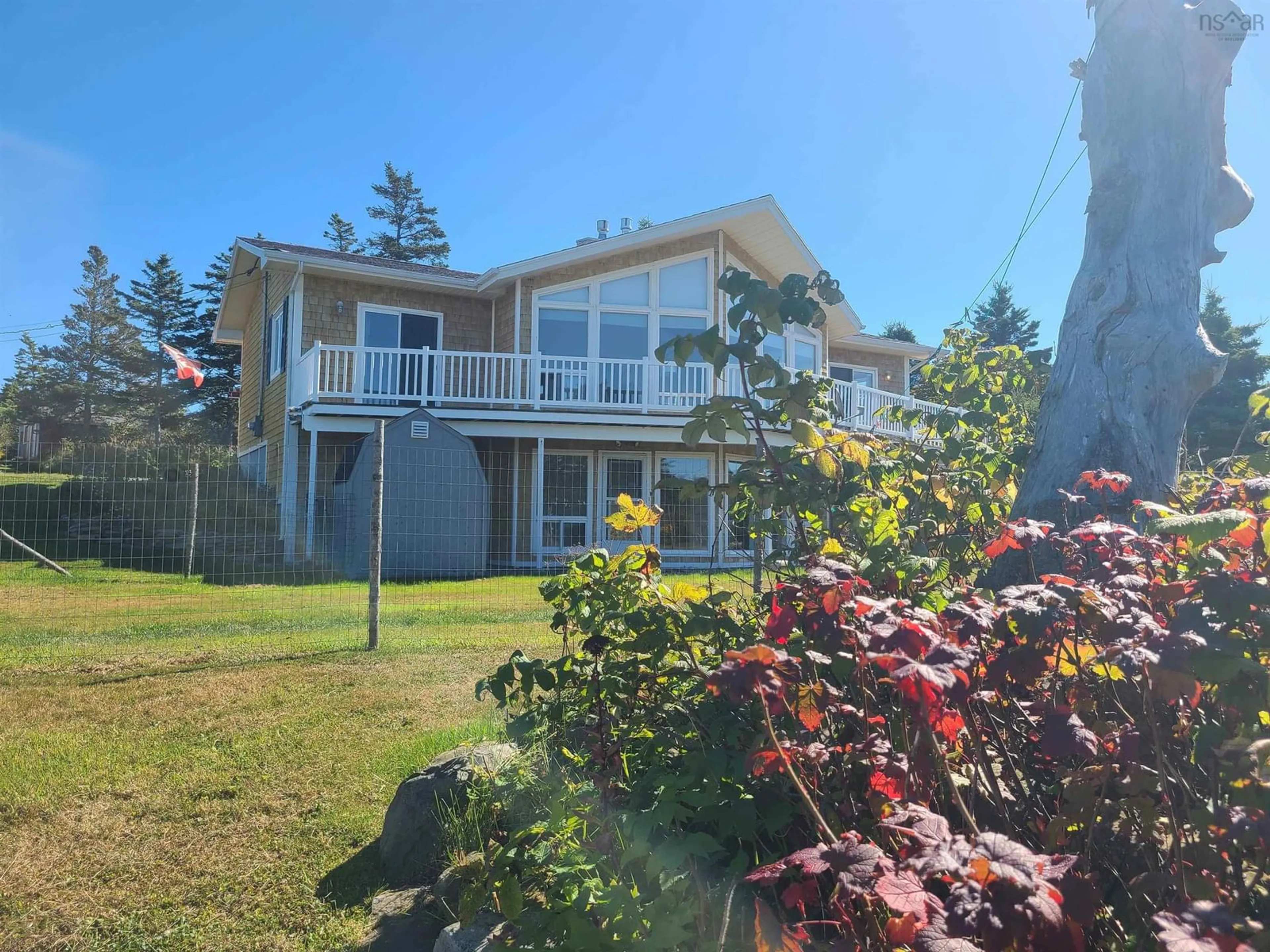 A pic from outside/outdoor area/front of a property/back of a property/a pic from drone, water/lake/river/ocean view for 2815 Main Shore Road Rd, Port Maitland Nova Scotia B5A 5C4