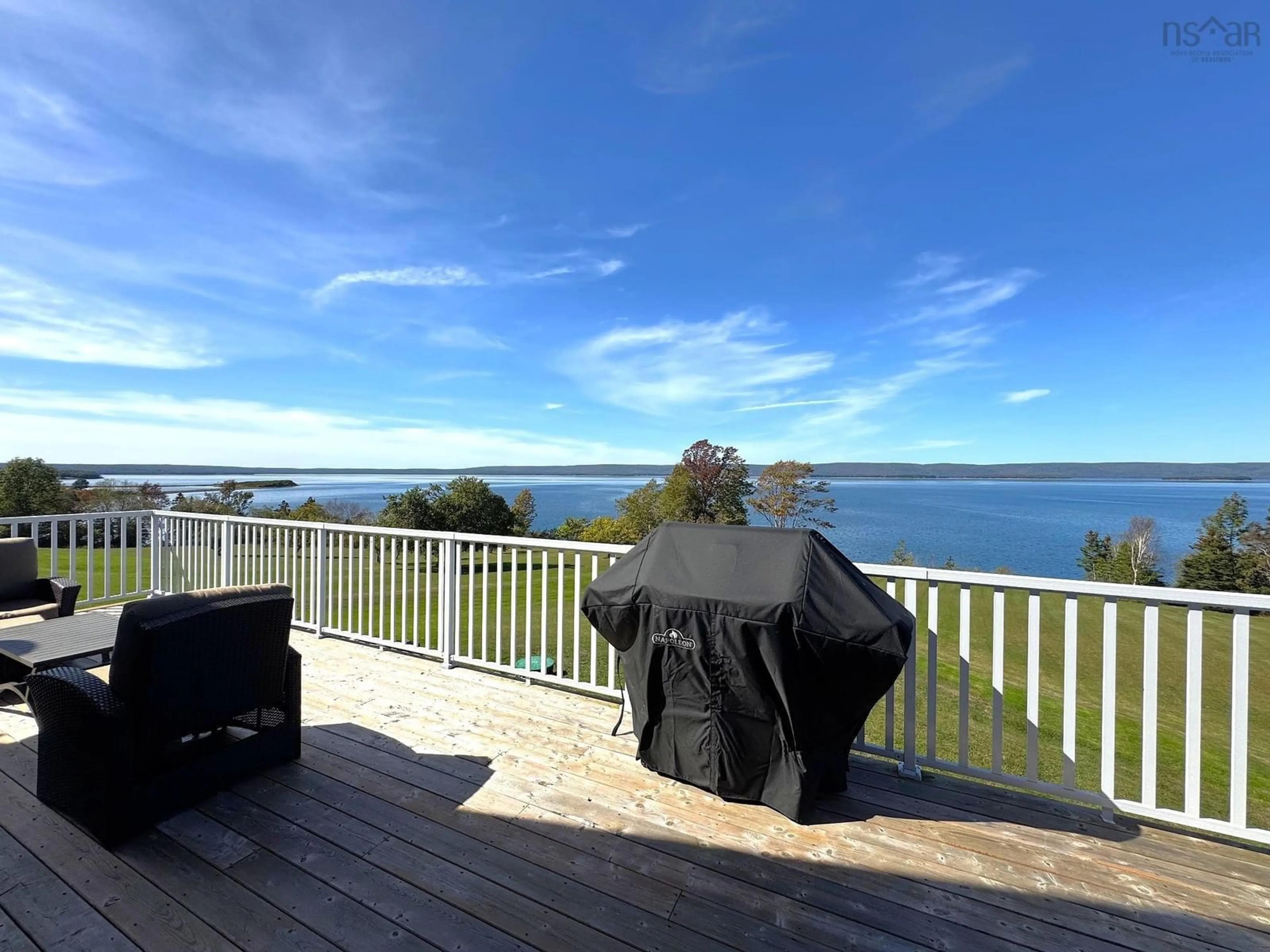 A pic from outside/outdoor area/front of a property/back of a property/a pic from drone, water/lake/river/ocean view for 3359 West Bay Rd, St. Georges Channel Nova Scotia B0E 3K0