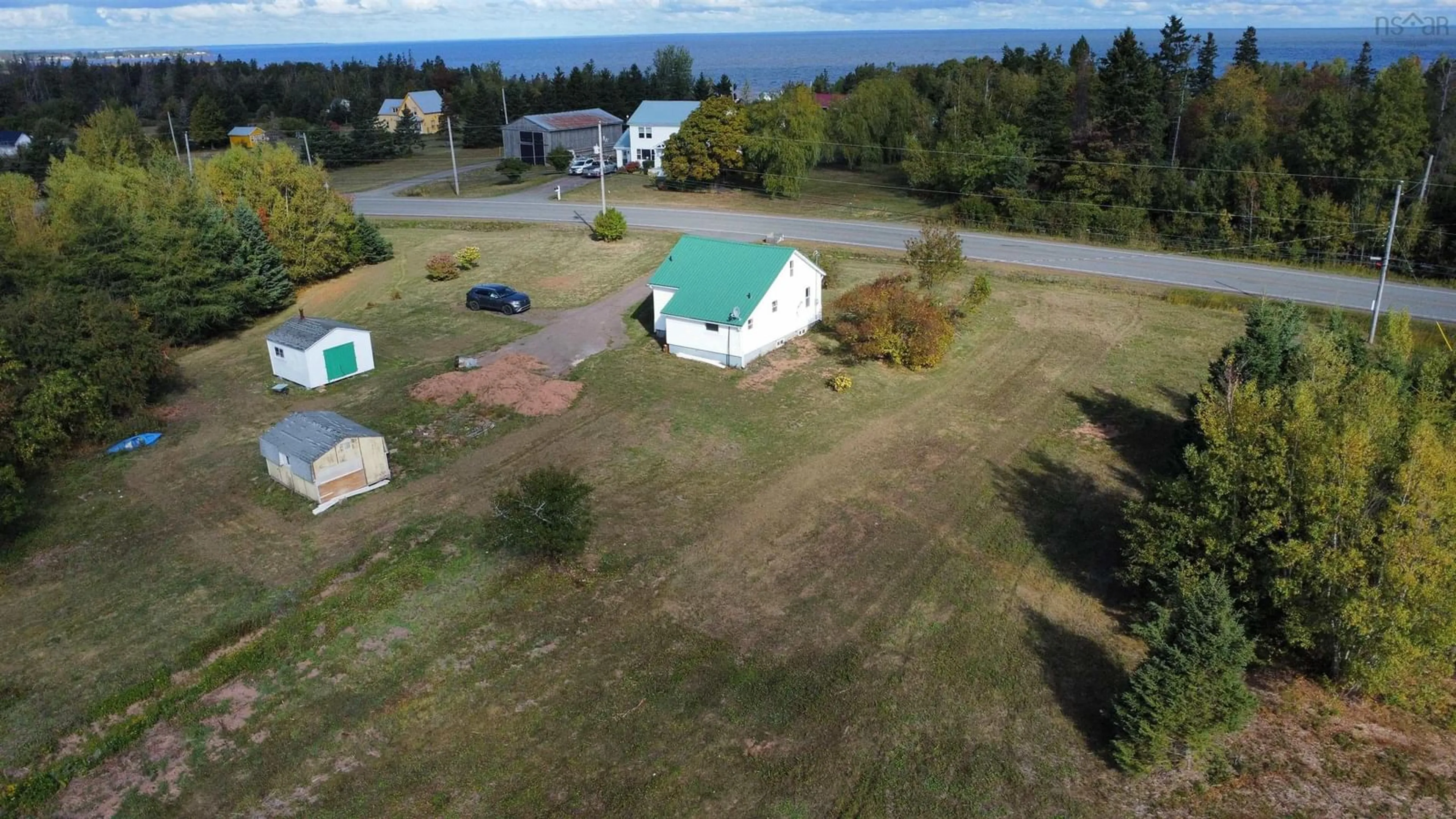 A pic from outside/outdoor area/front of a property/back of a property/a pic from drone, water/lake/river/ocean view for 9080 Hwy#6 Hwy, Pugwash Nova Scotia B0K 1L0