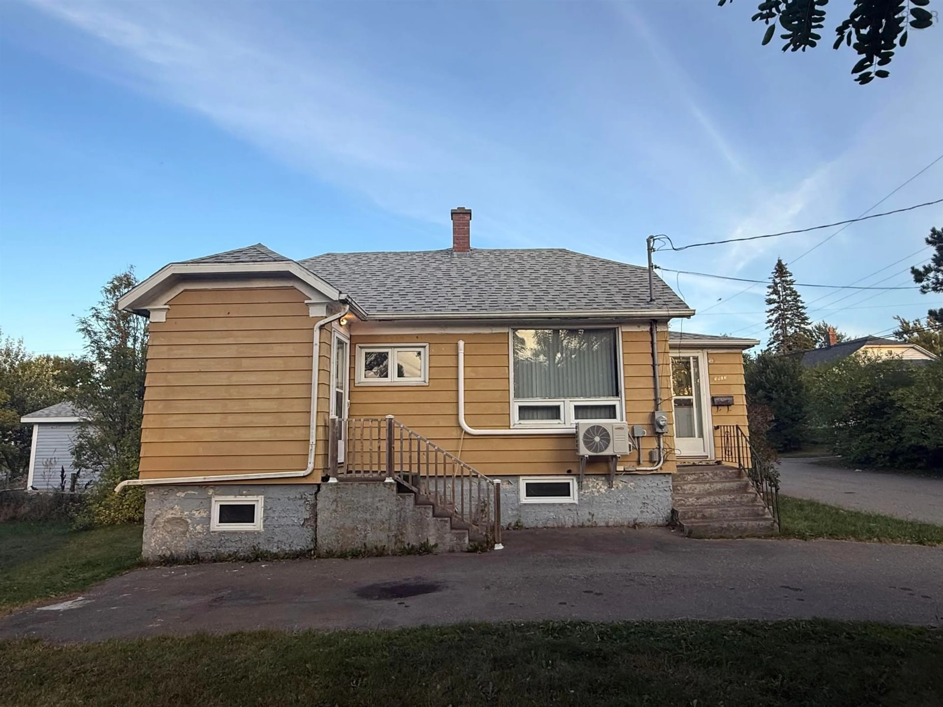 Home with vinyl exterior material, street for 3513 Spruce St, New Waterford Nova Scotia B1H 2C4