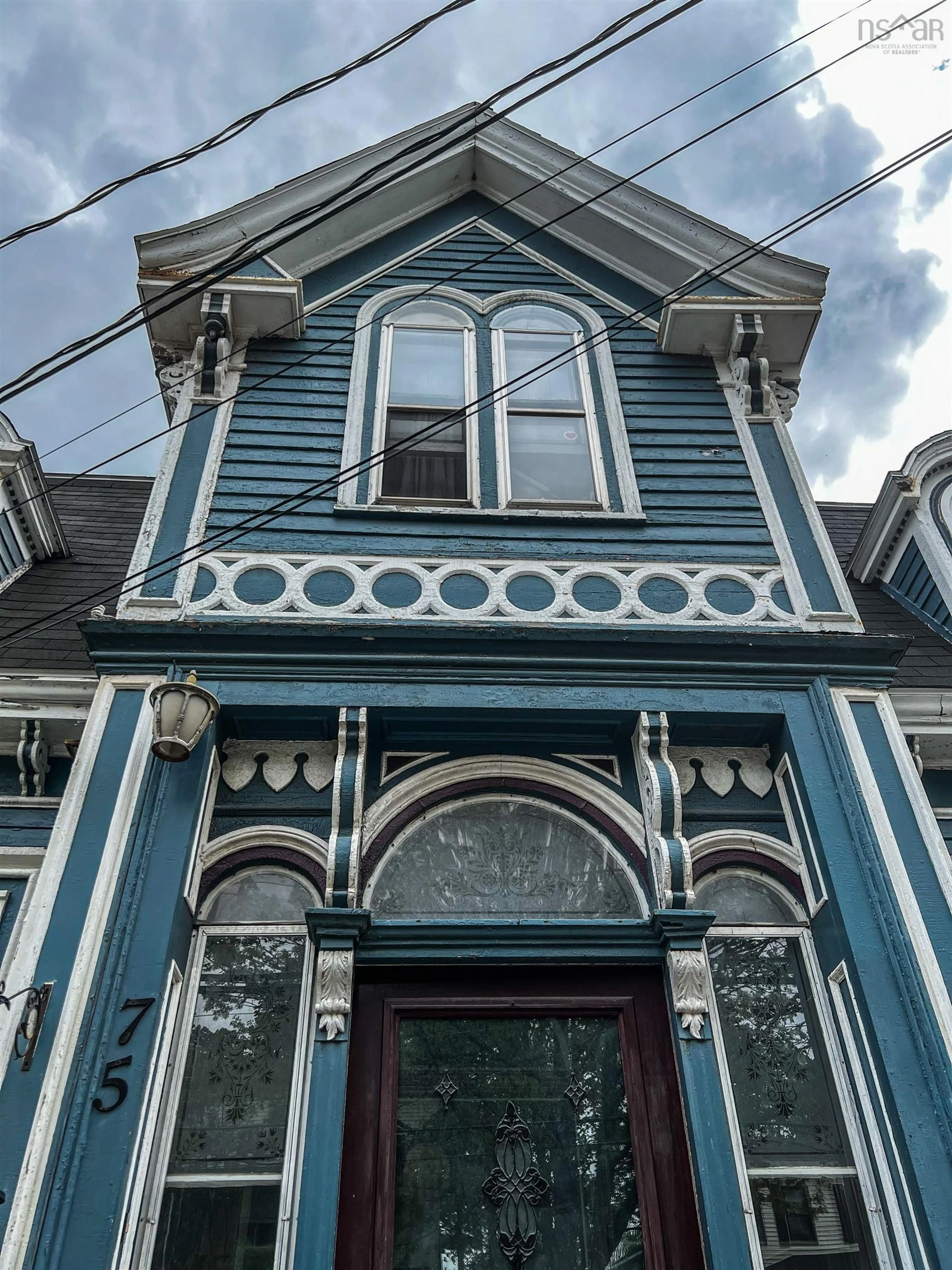 Home with vinyl exterior material, street for 75 Denoon St, Pictou Nova Scotia B0K 1H0