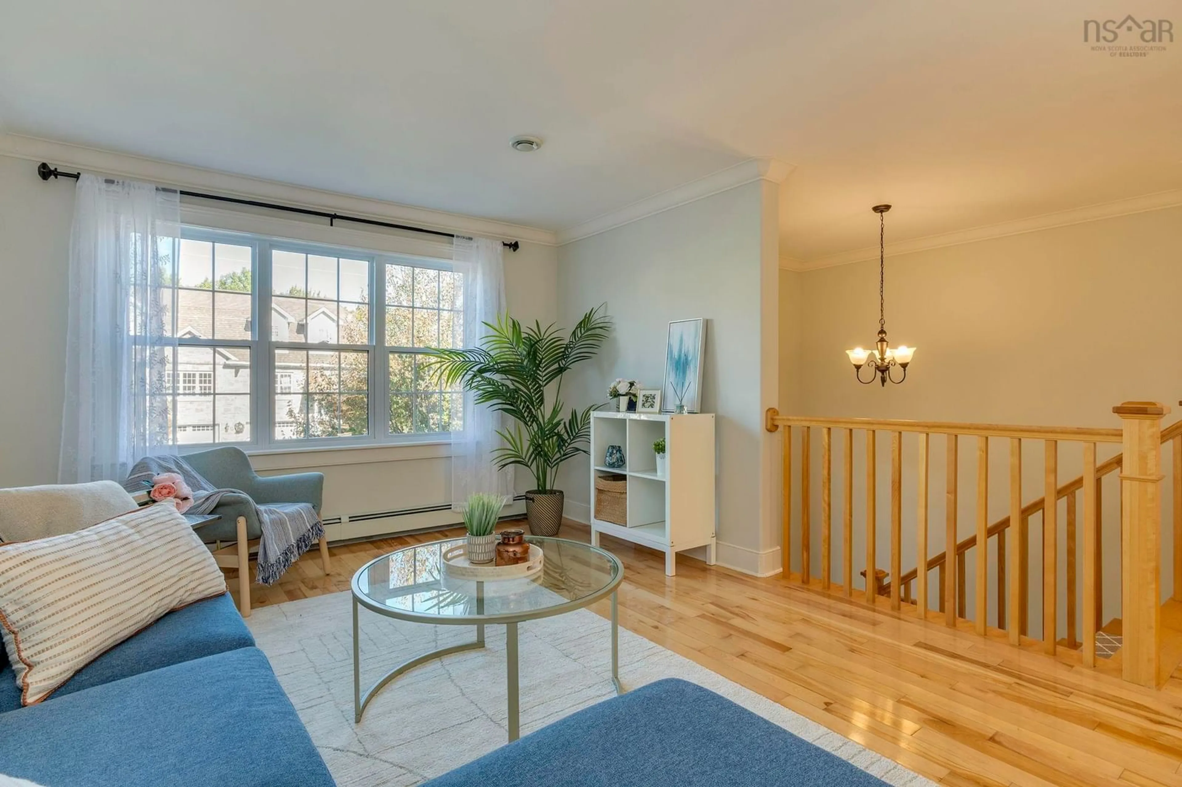 Living room with furniture, wood/laminate floor for 29 Lasalle Crt, West Bedford Nova Scotia B4B 0H8