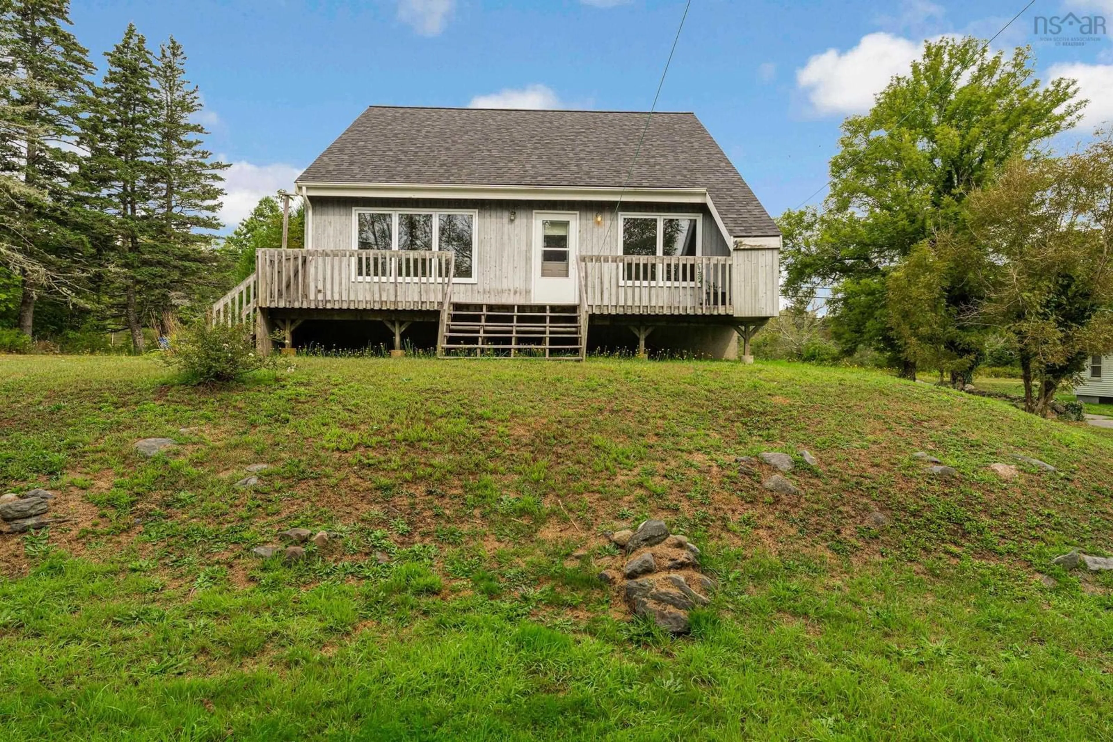 A pic from outside/outdoor area/front of a property/back of a property/a pic from drone, water/lake/river/ocean view for 10247 Highway 3, Arcadia Nova Scotia B0W 1B0
