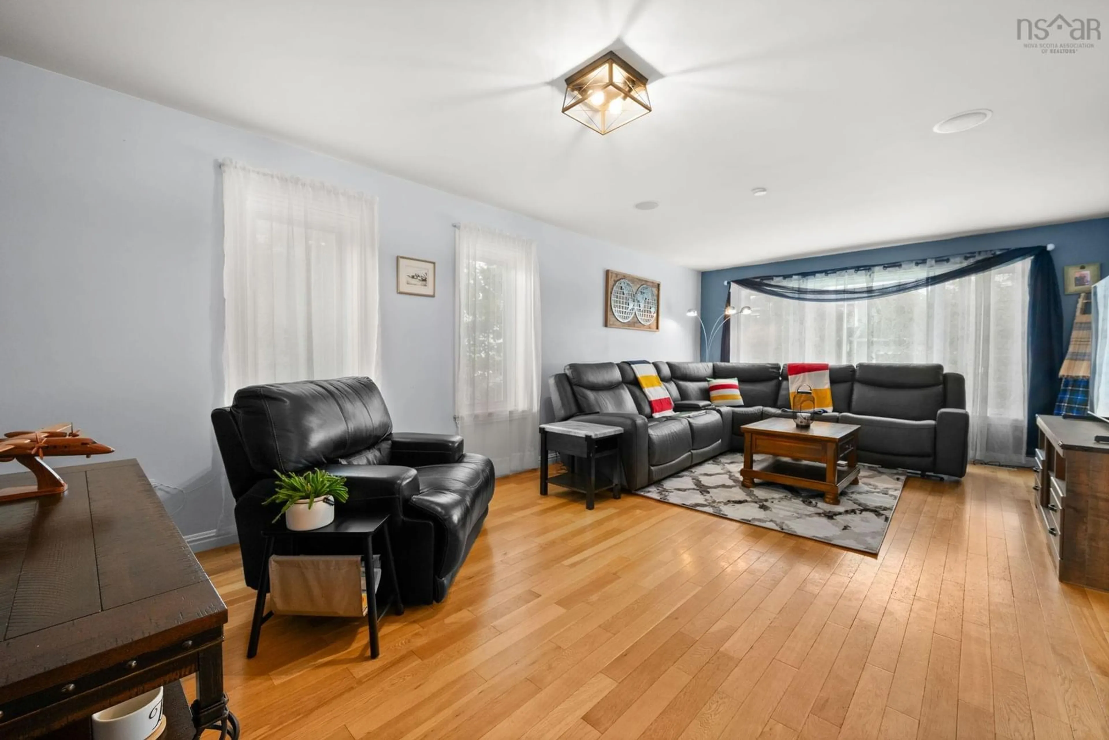 Living room with furniture, wood/laminate floor for 3 Vernon Crt, Elmsdale Nova Scotia B2S 0A1