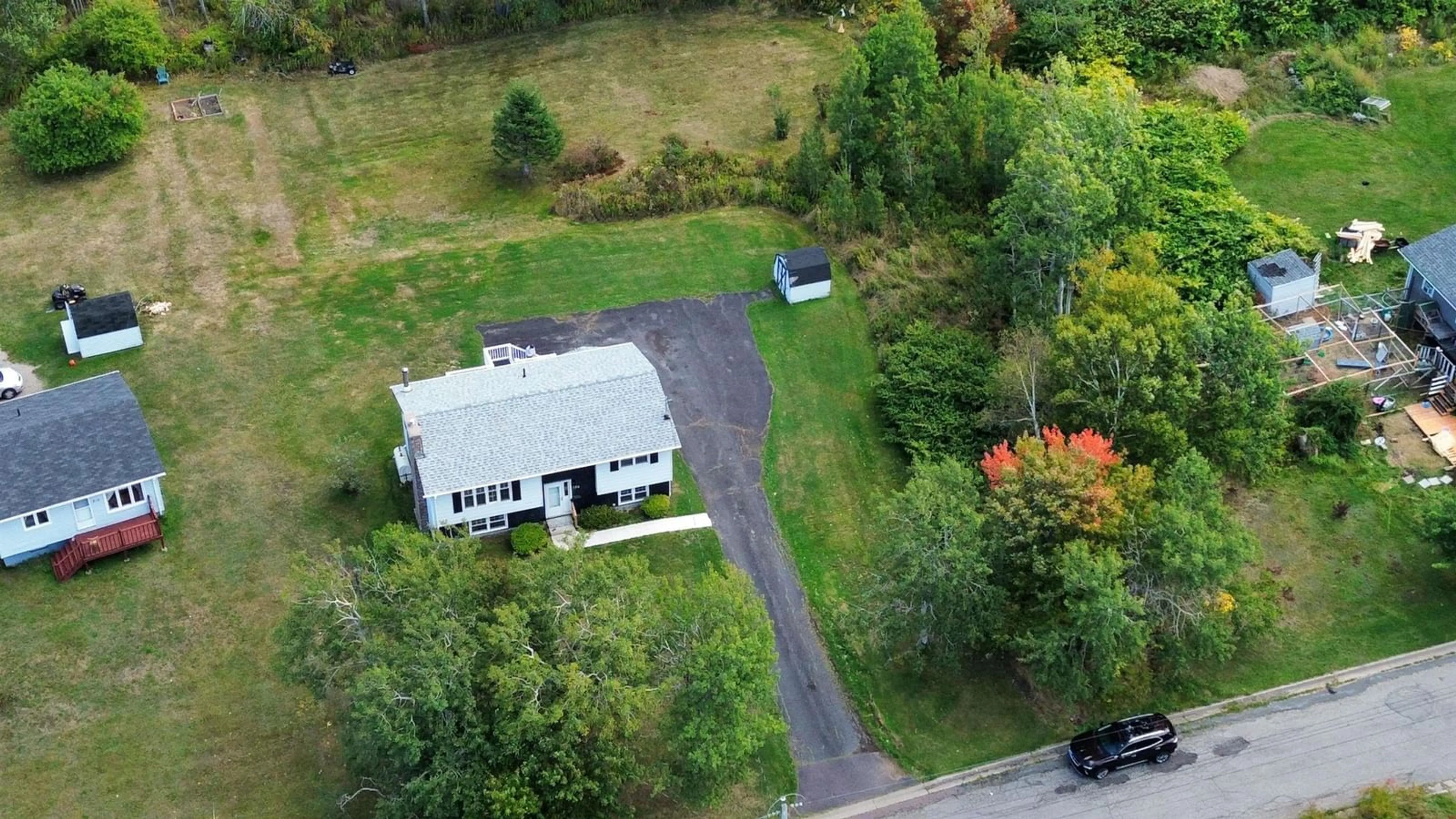 A pic from outside/outdoor area/front of a property/back of a property/a pic from drone, unknown for 756 Forsythe St, New Waterford Nova Scotia B1H 2Y5